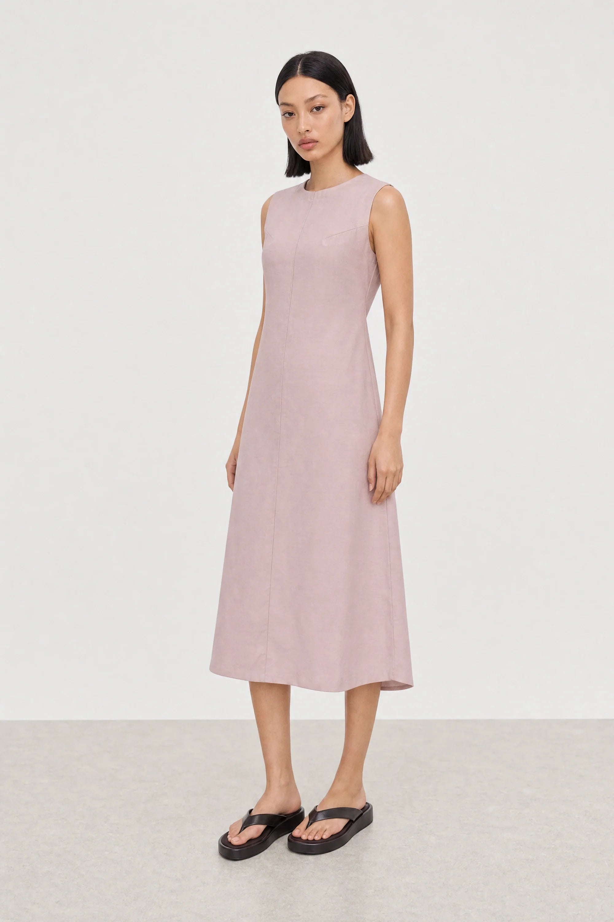 Baby pink tie up peek back dress