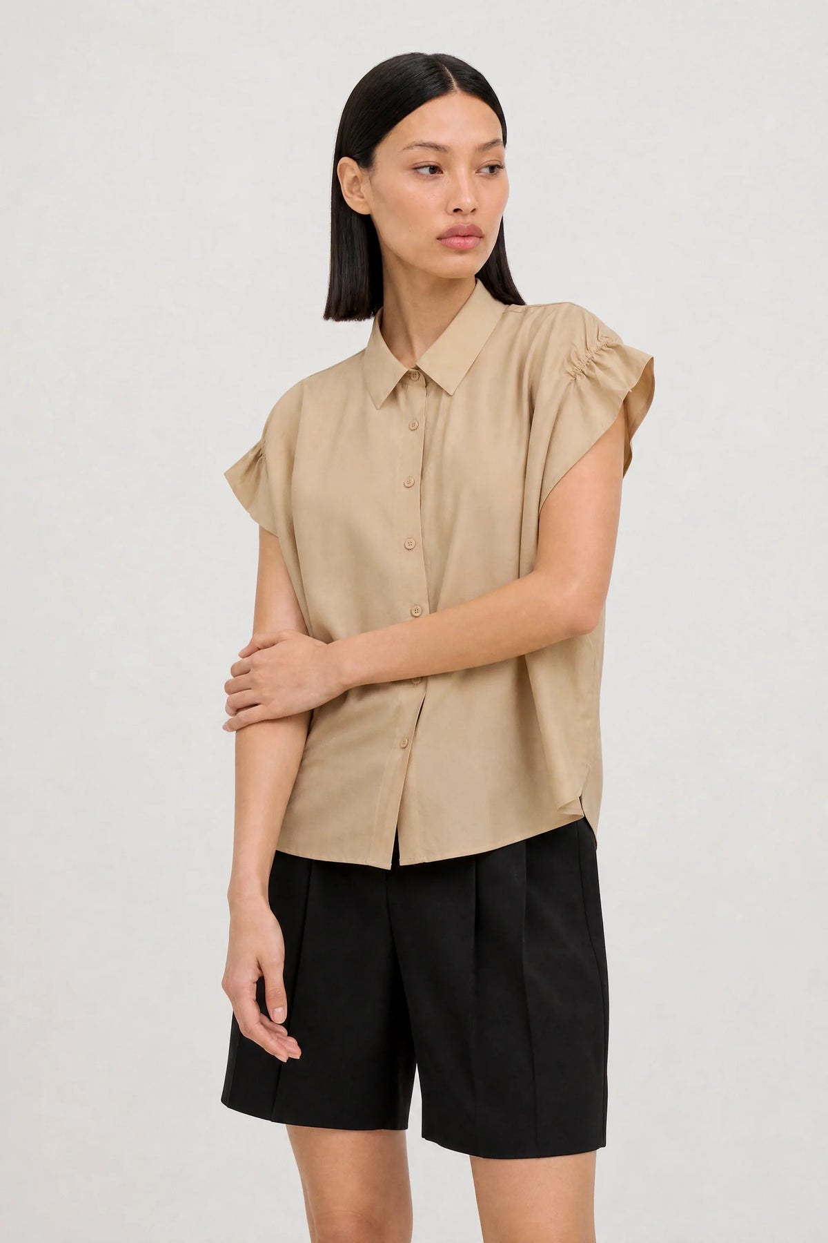 Beige gathered shoulder short sleeved shirt