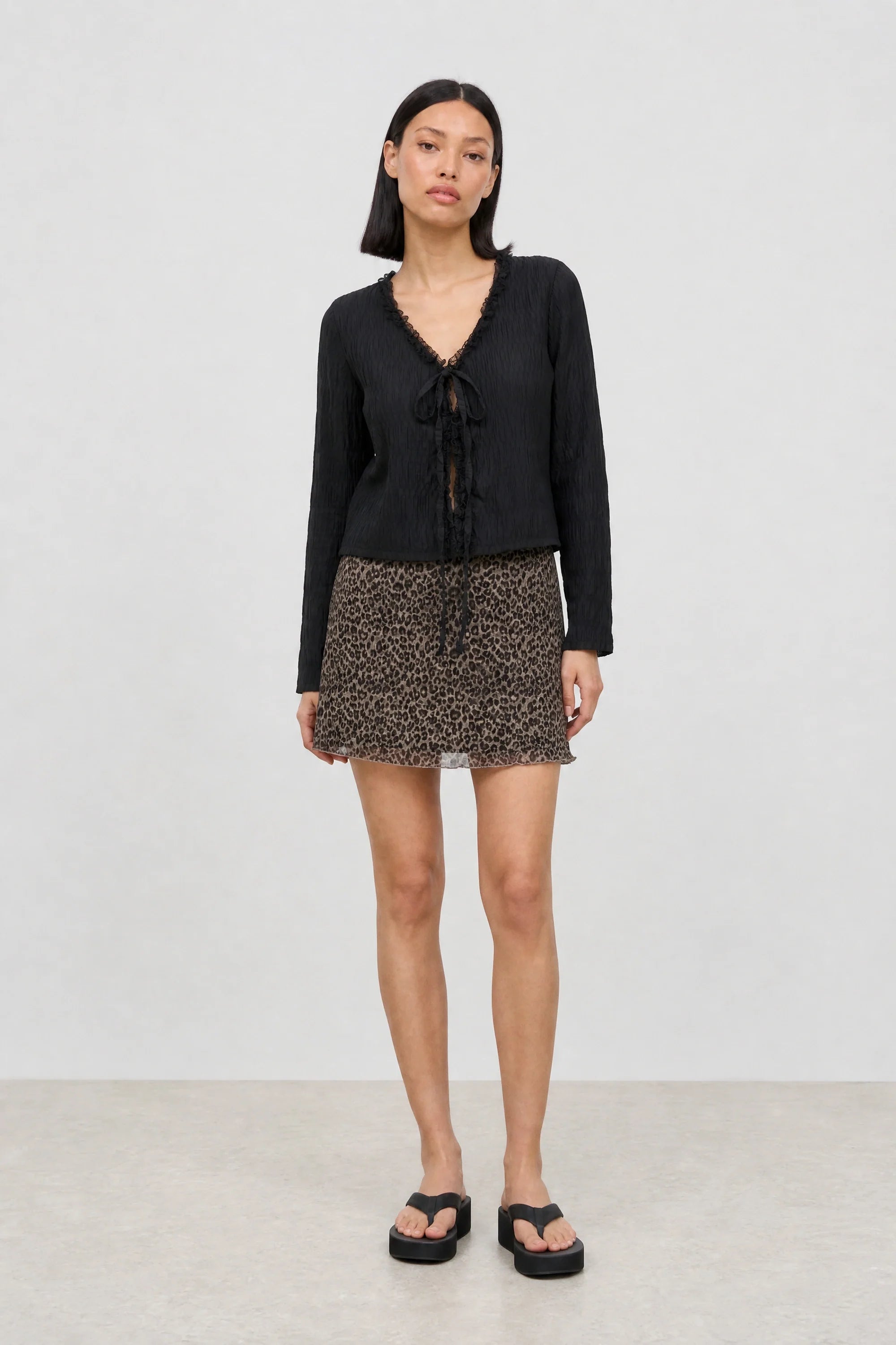 Beige leopard print mini skirt