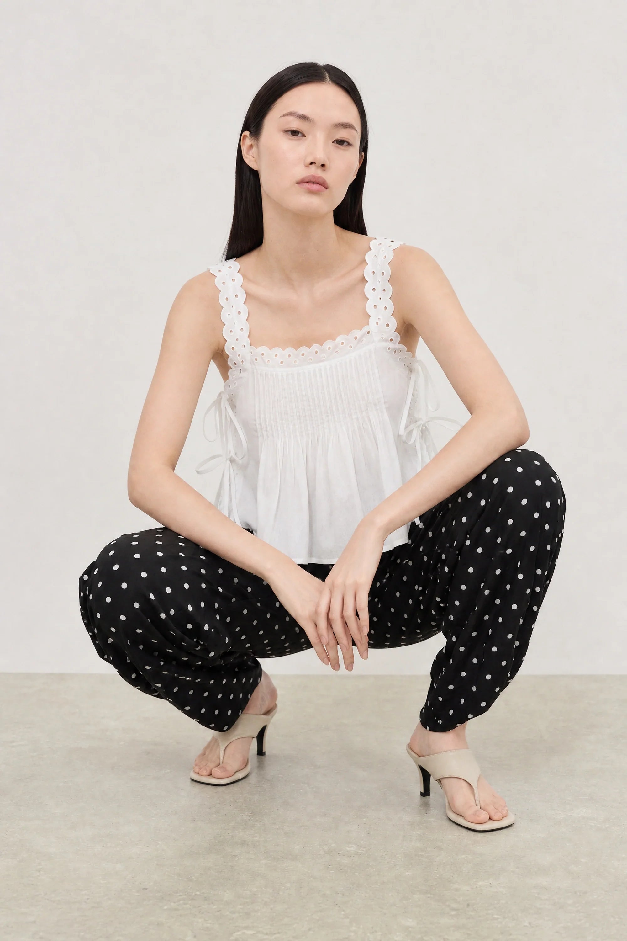 Black and white polka dot linen blend slouchy trousers