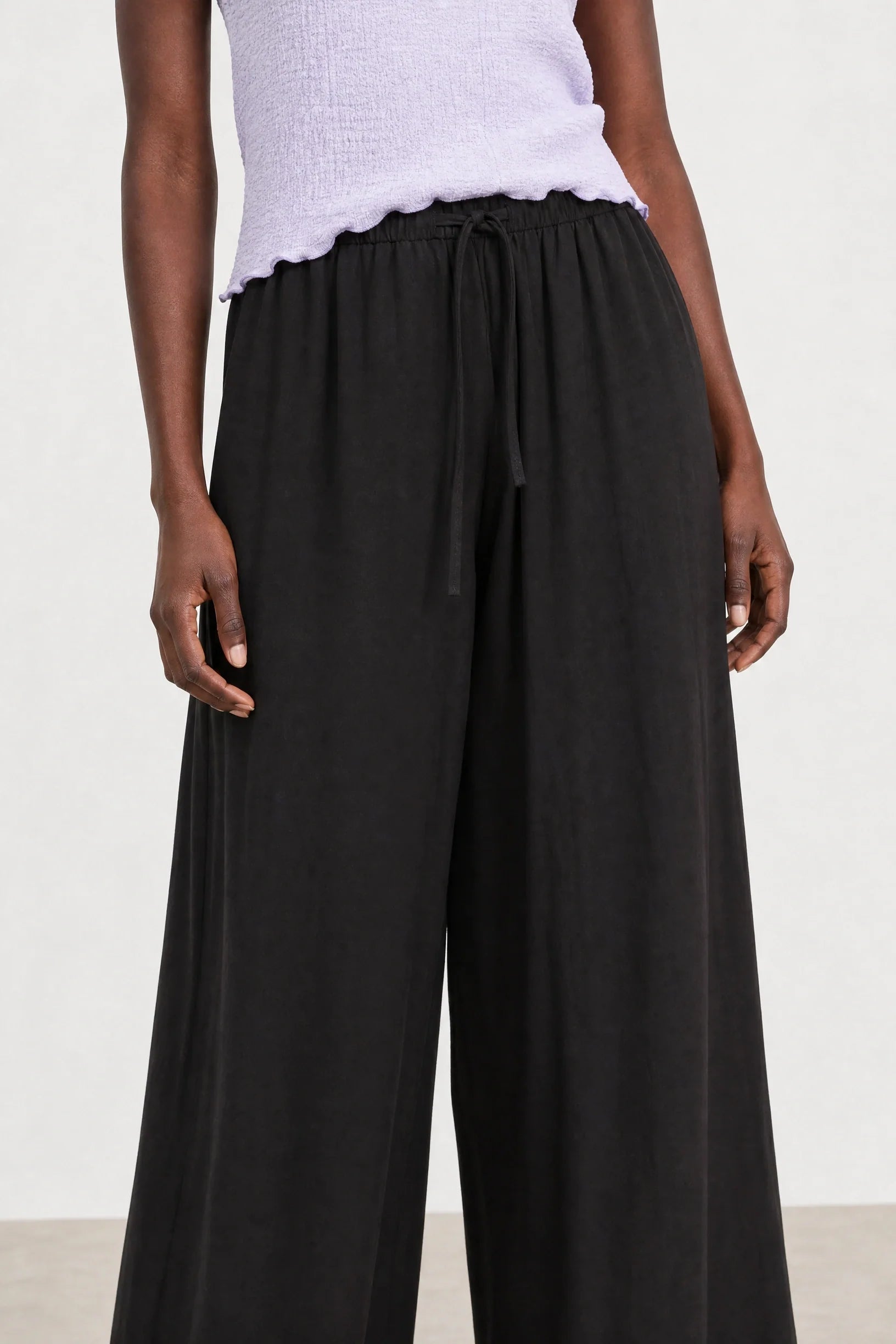 Black floaty wide leg drawstring trousers