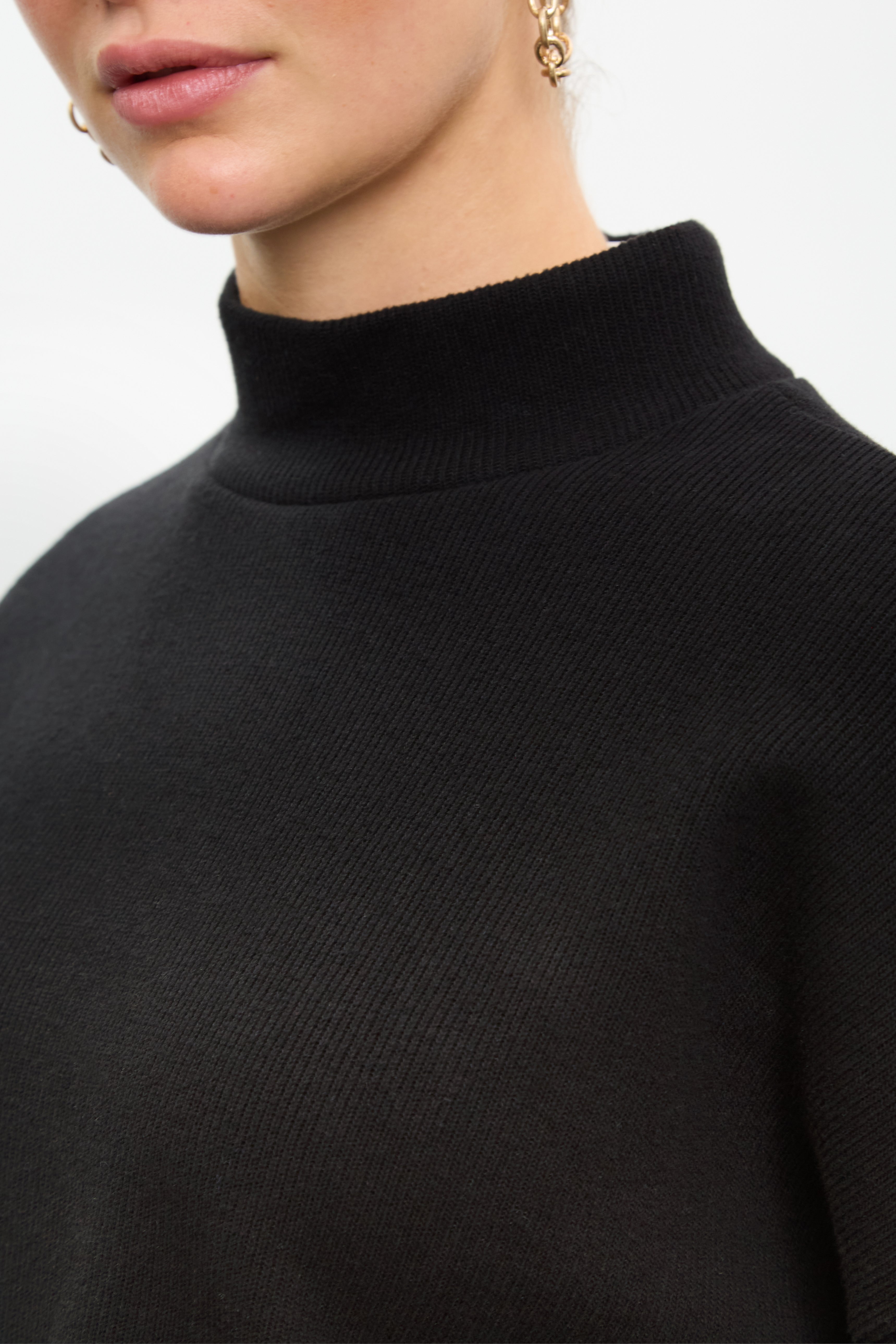 Black micro ribbed mock neck top