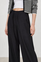 Black thick ruched waist silky trousers