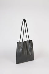 Black vegan leather pinched strap tote bag
