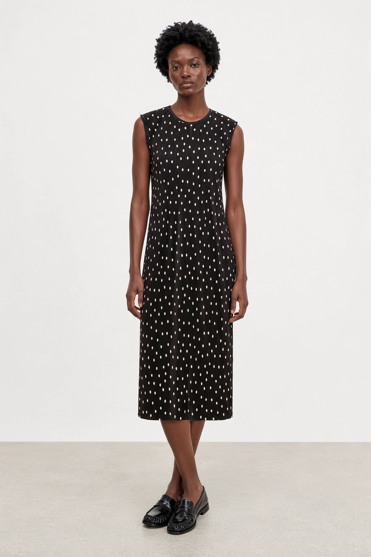 Black and ivory polka dot ribbed sleeveless column dress