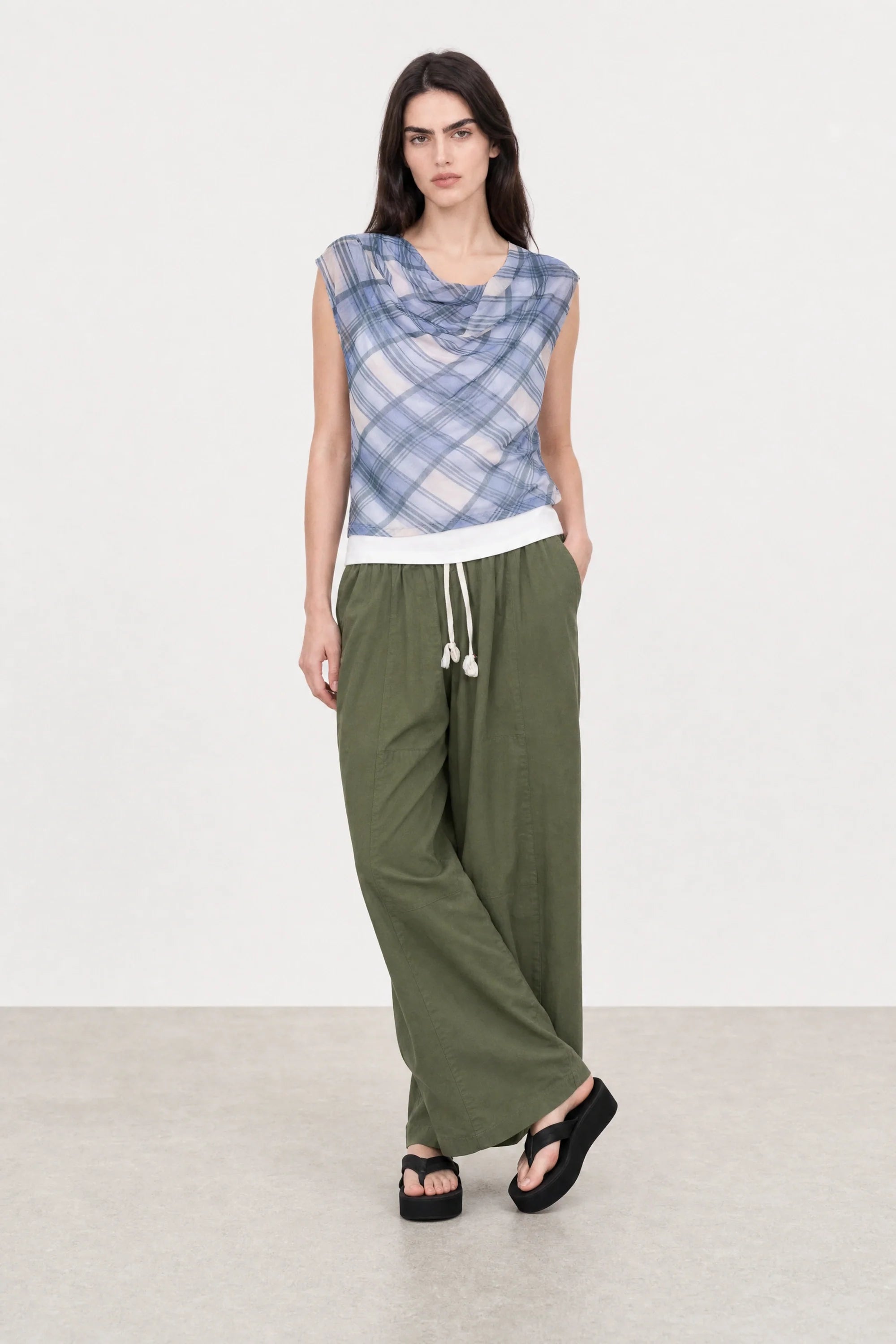 Blue and green plaid draped top