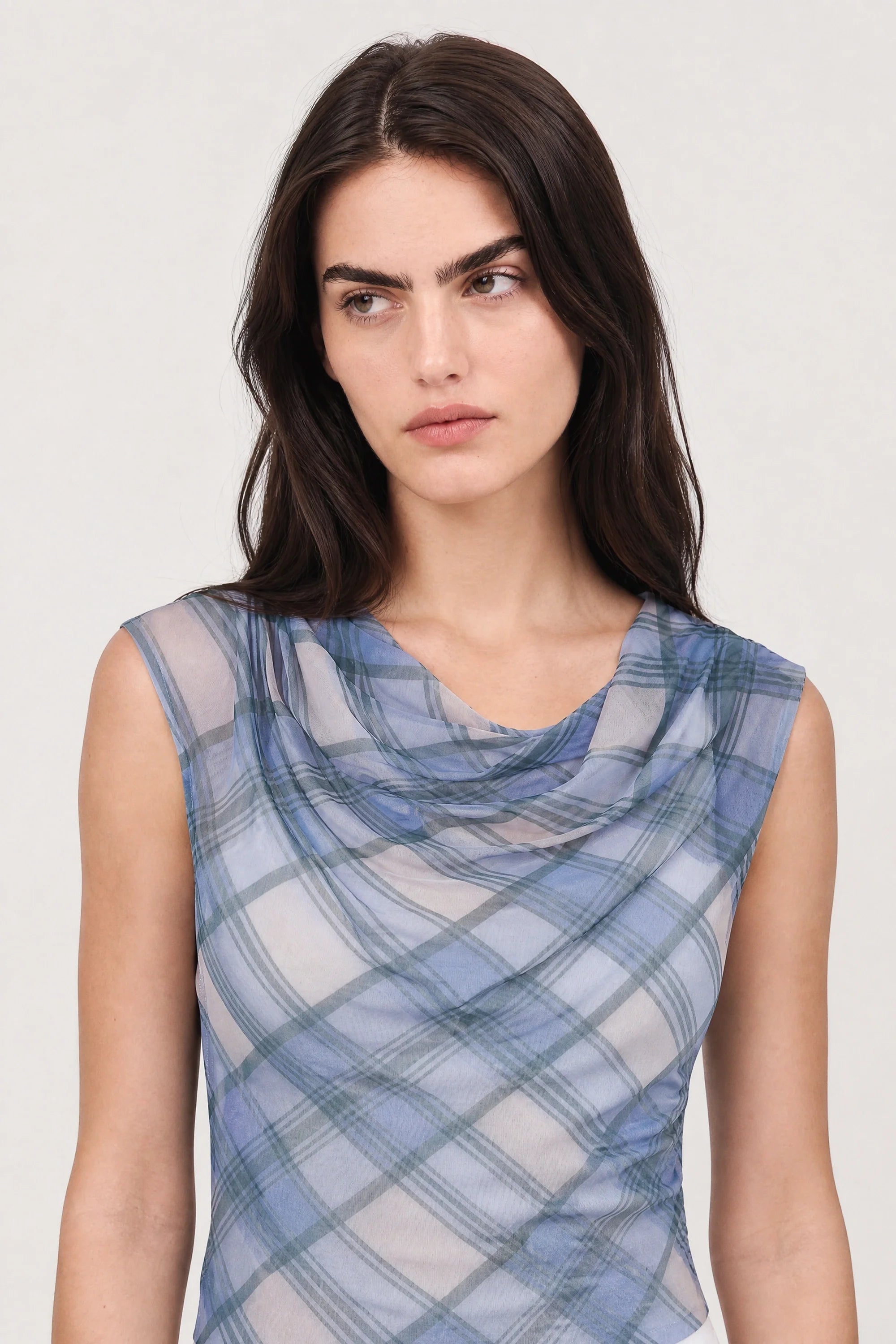 Blue and green plaid draped top