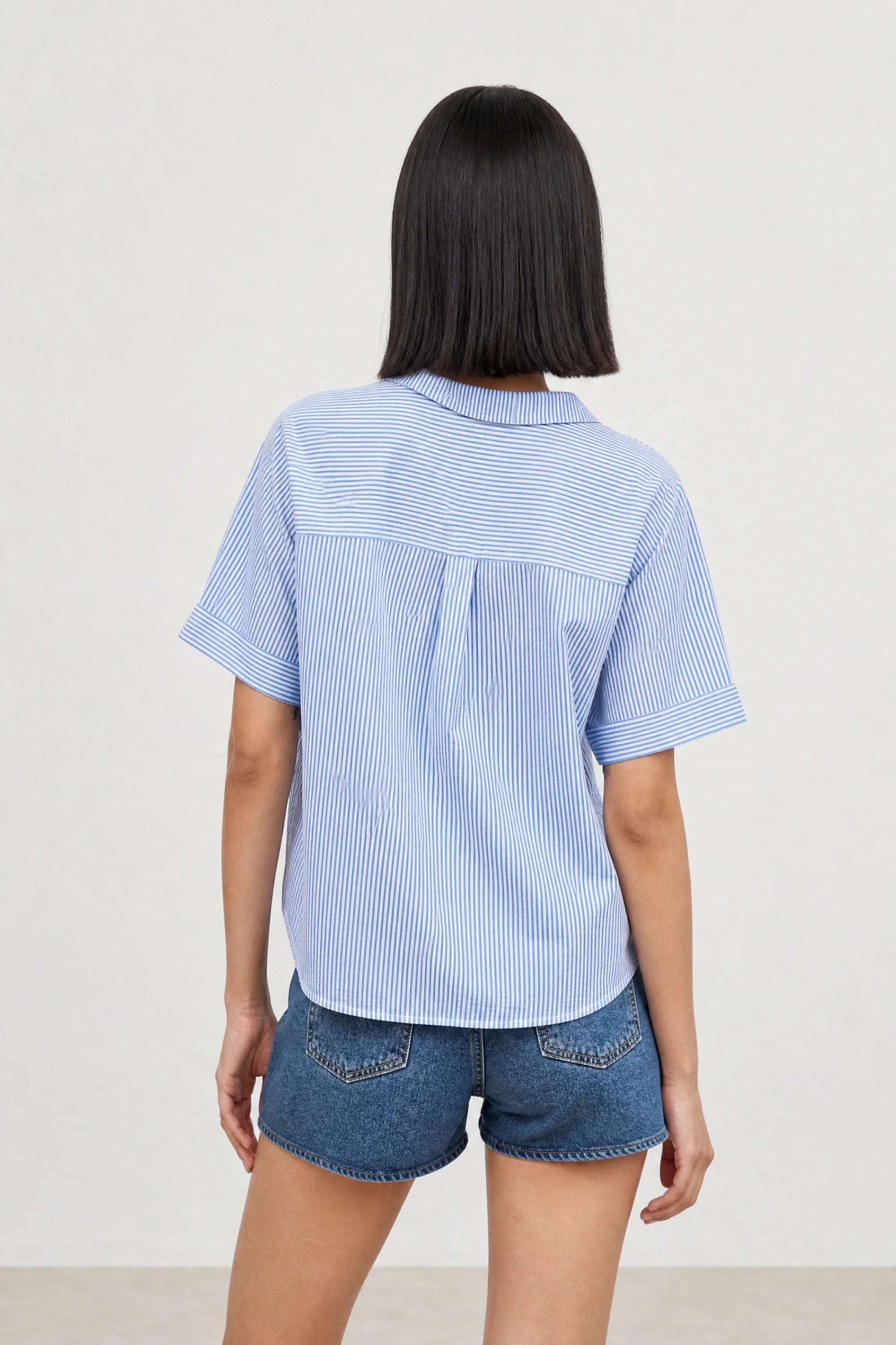 Blue and white seersucker striped shirt