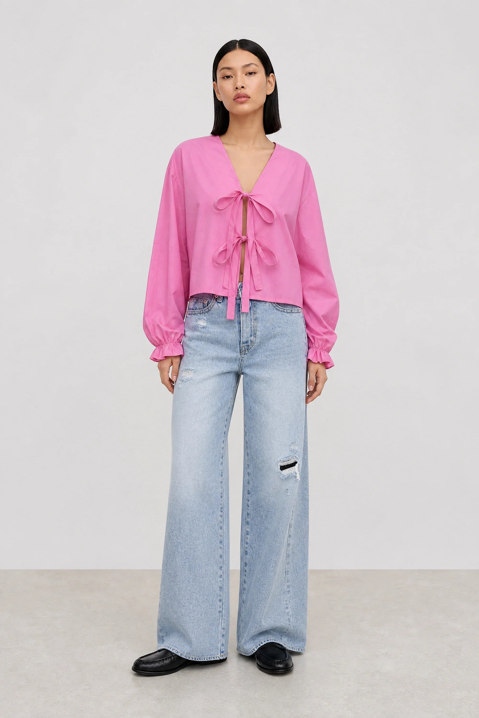 Blue light wash distressed detail jeans