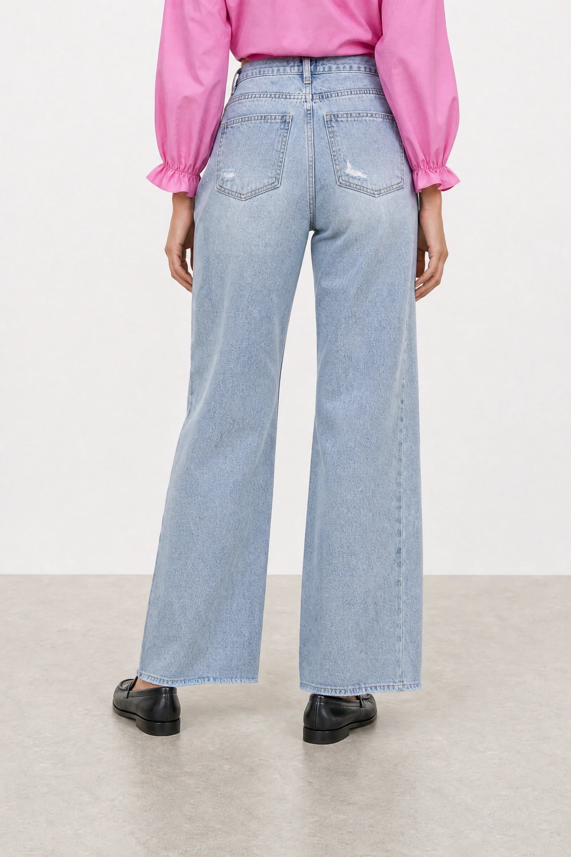 Blue light wash distressed detail jeans