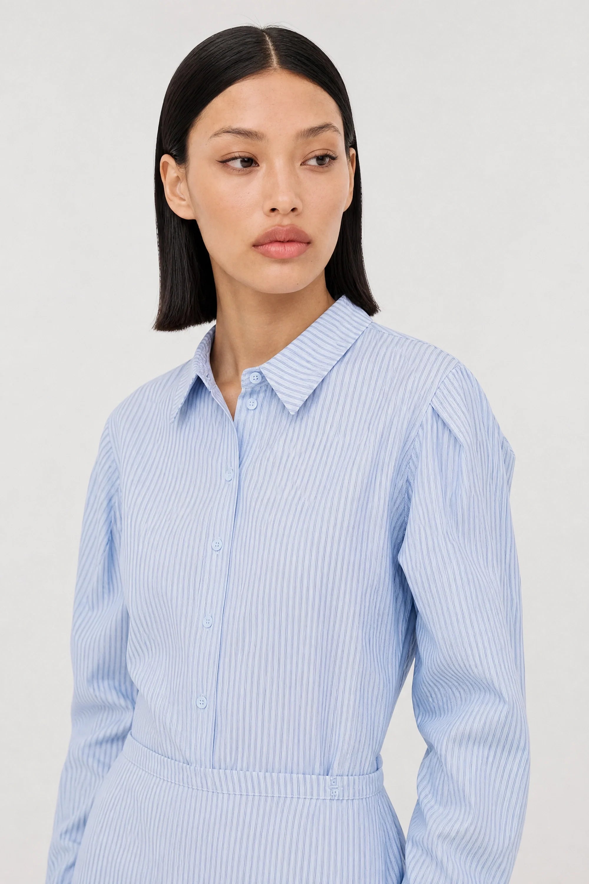 Blue vertical striped wrap waist shirt
