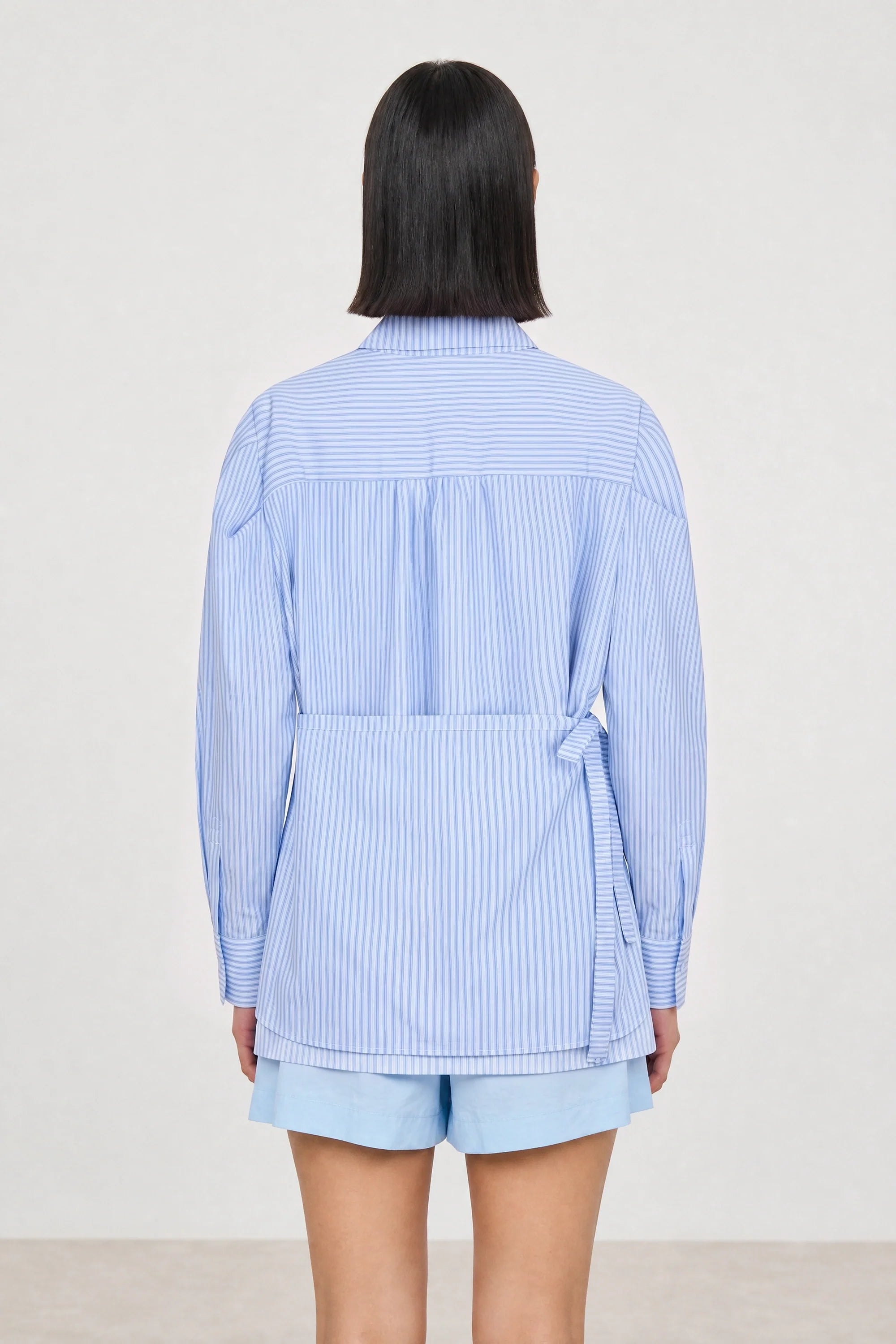 Blue vertical striped wrap waist shirt