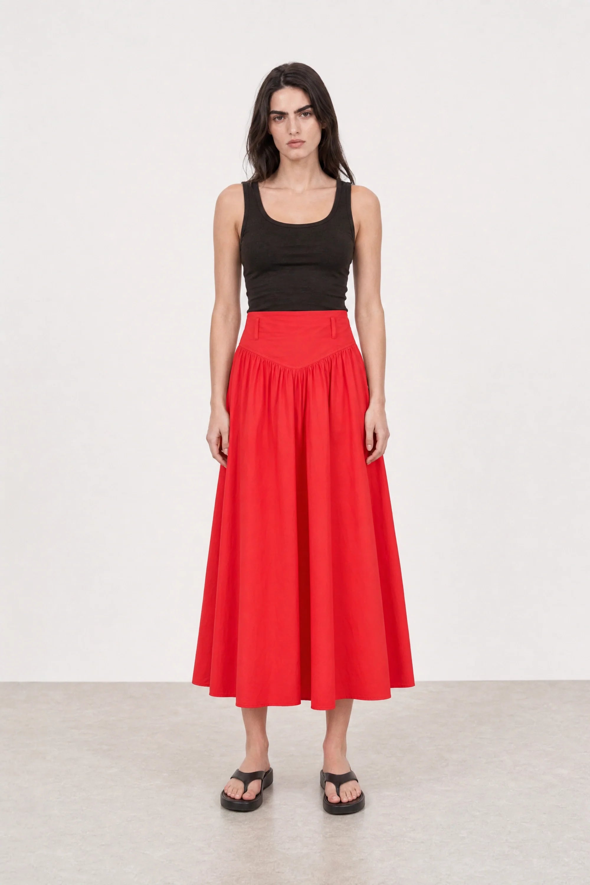 Bright red drop waist midi skirt