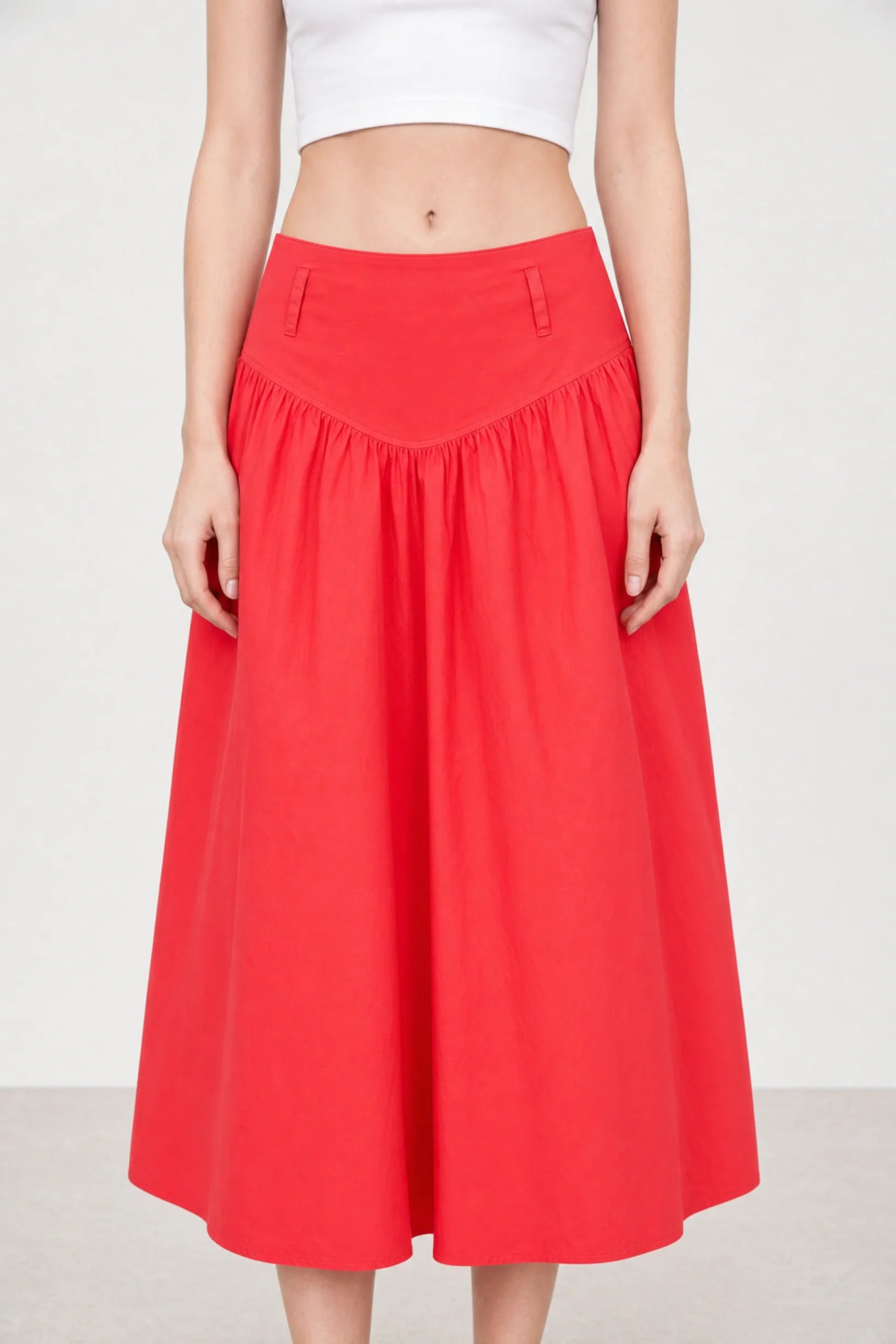 Bright red drop waist midi skirt