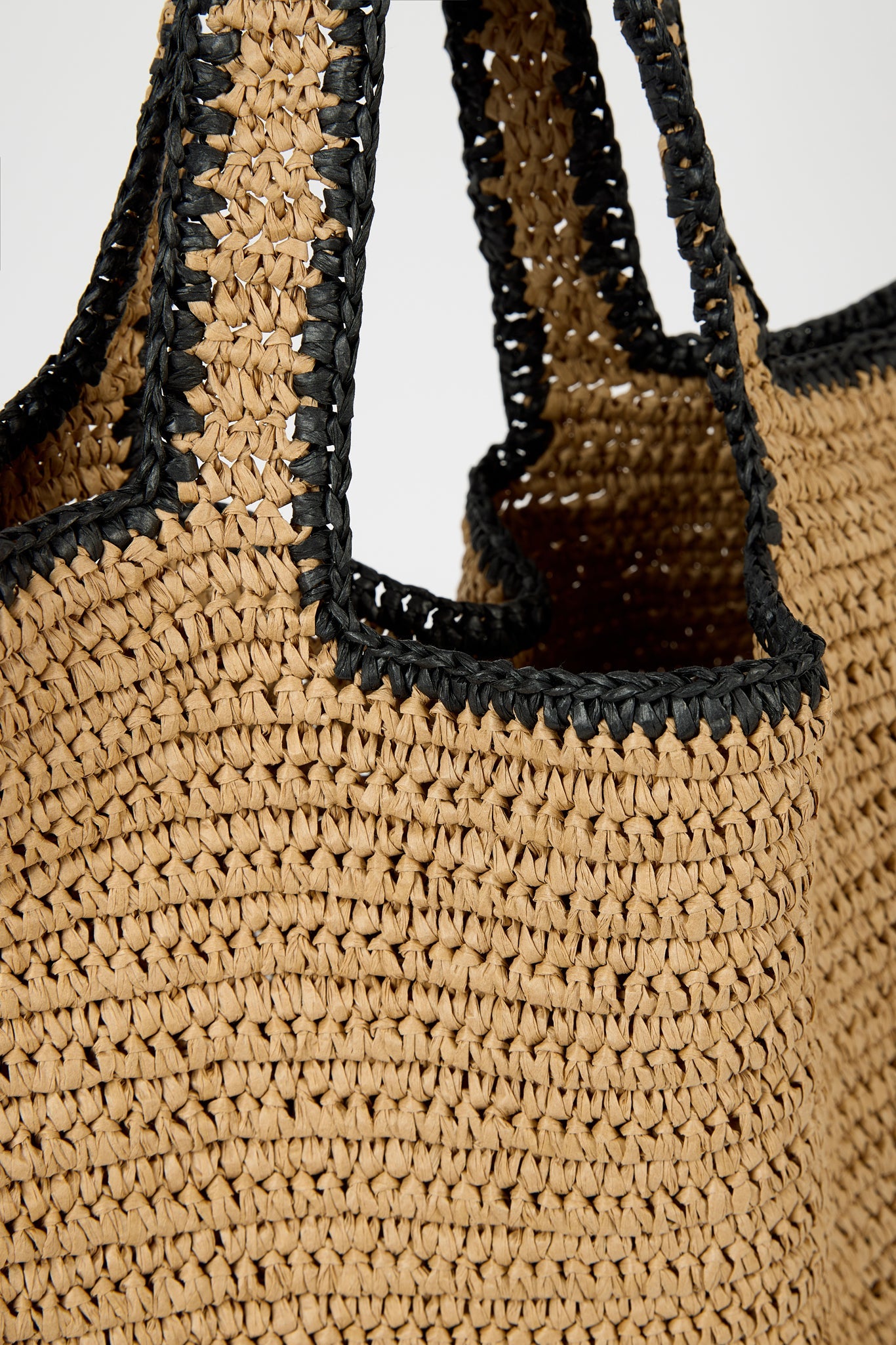 Dark beige black trimmed striped straw tote bag