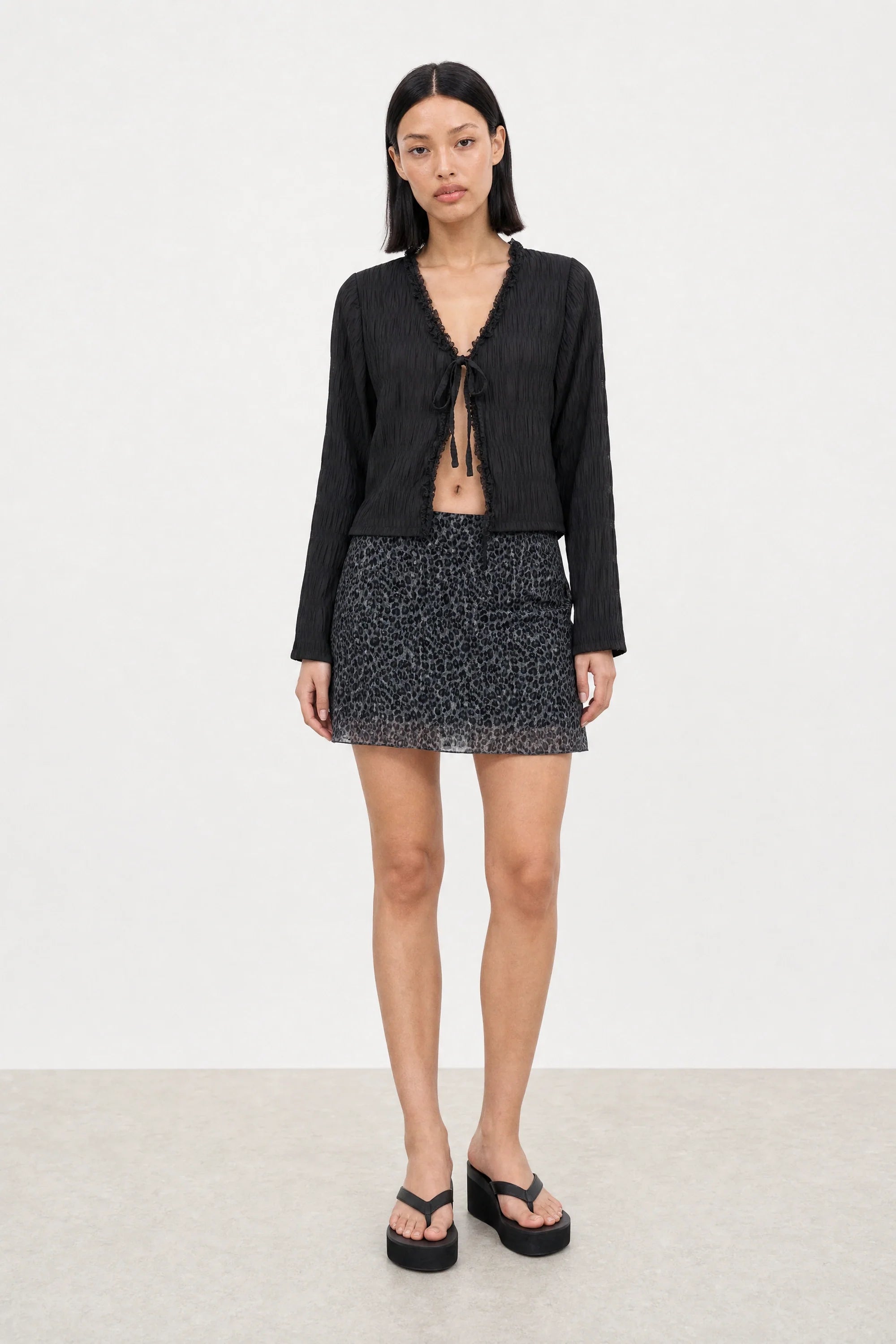 Dark grey leopard print mini skirt