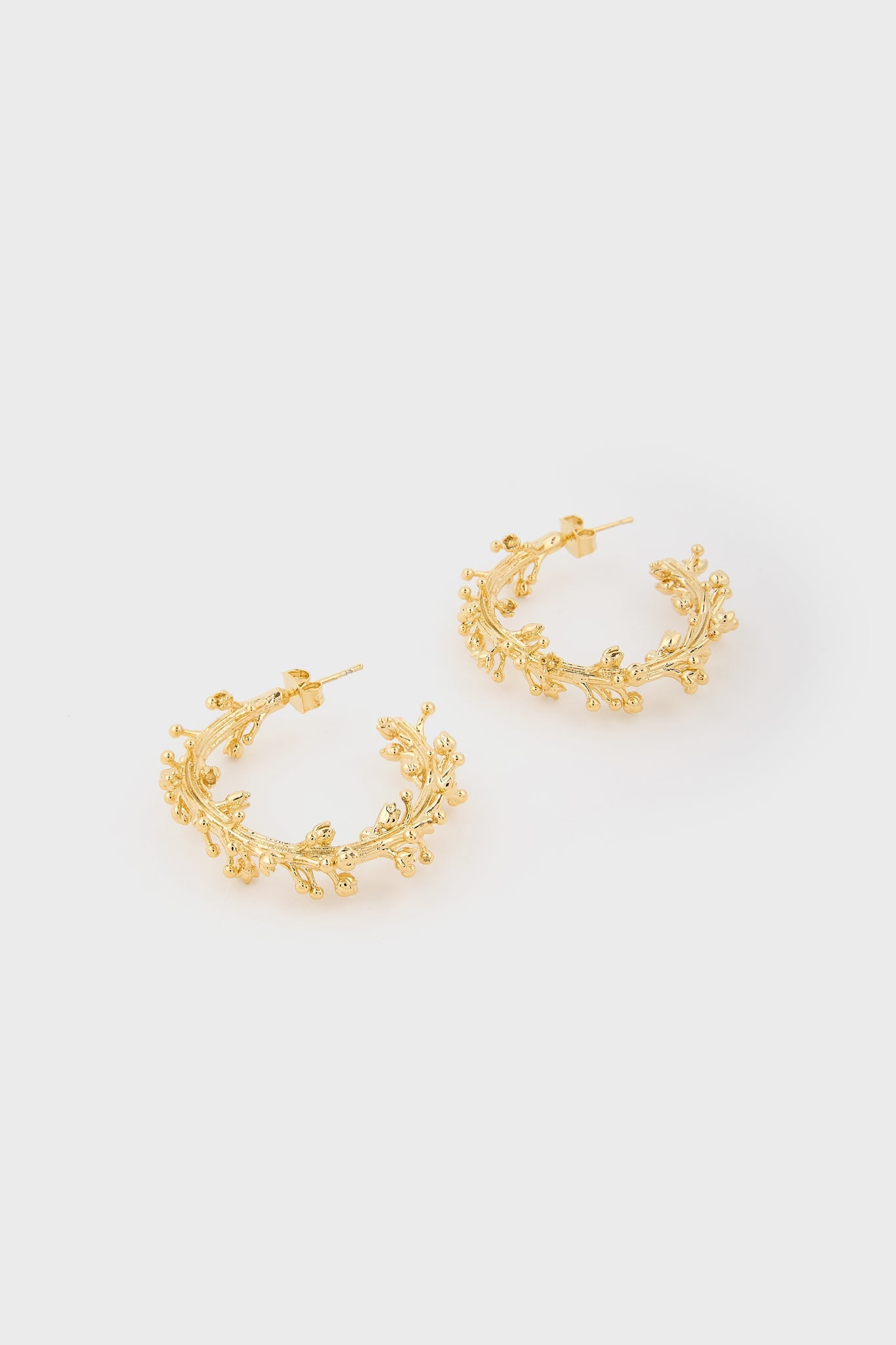 Gold branch hoop earrings