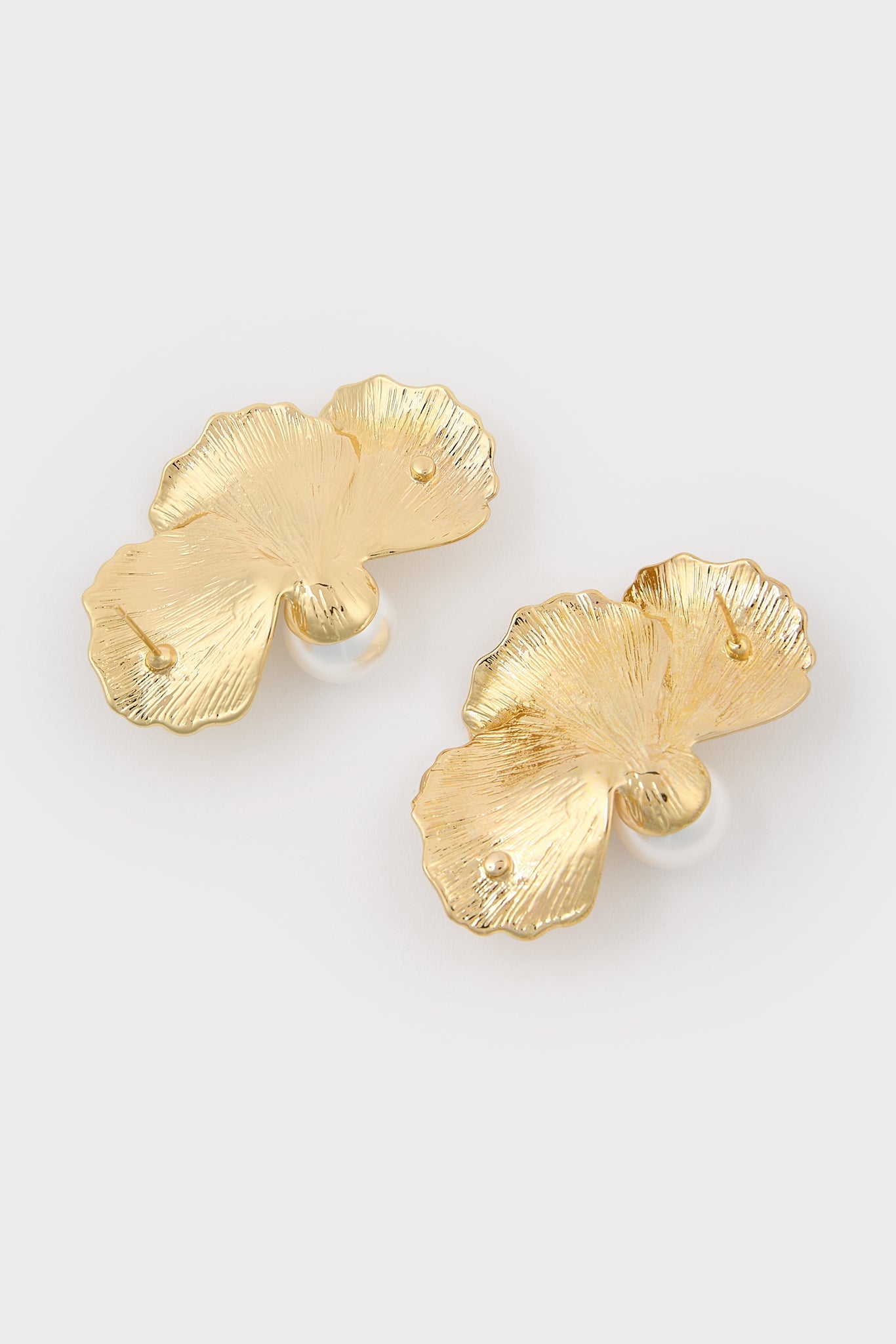 Gold single pearl half flower earrings