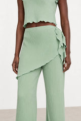 Green blue ribbed flare trousers