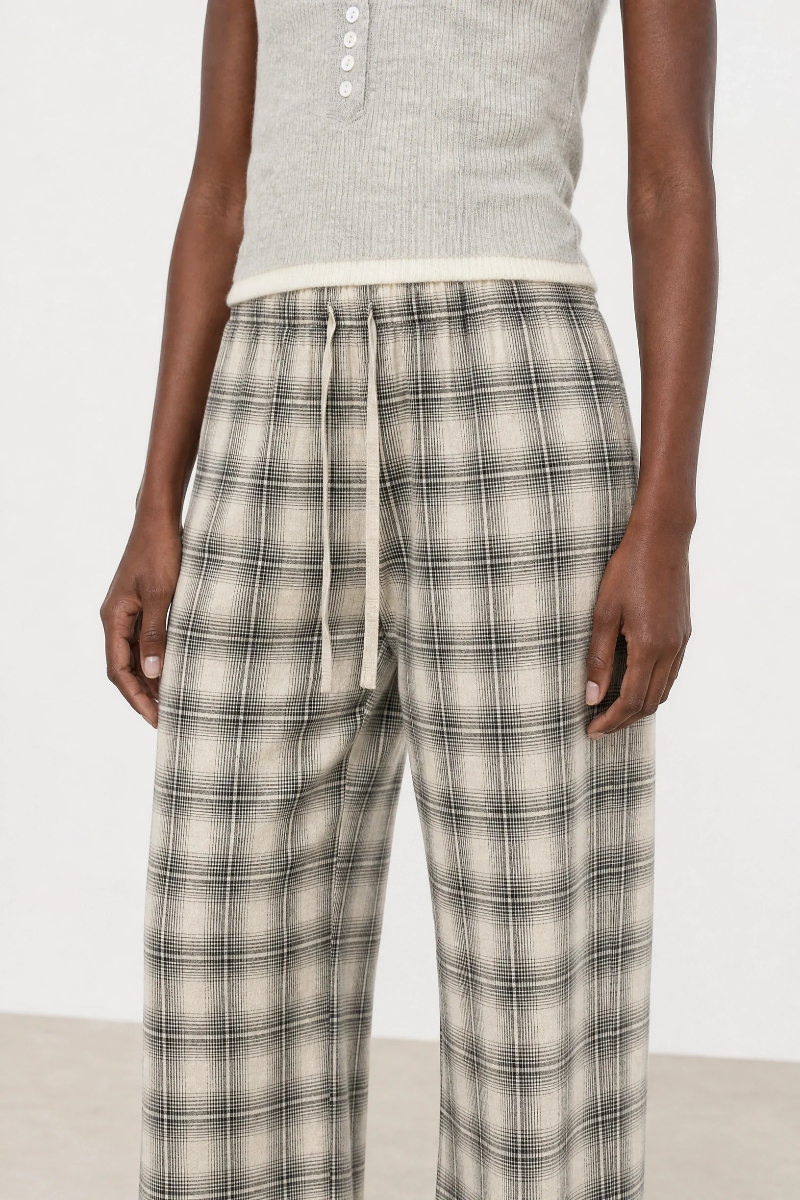 Ivory plaid tie waist trousers