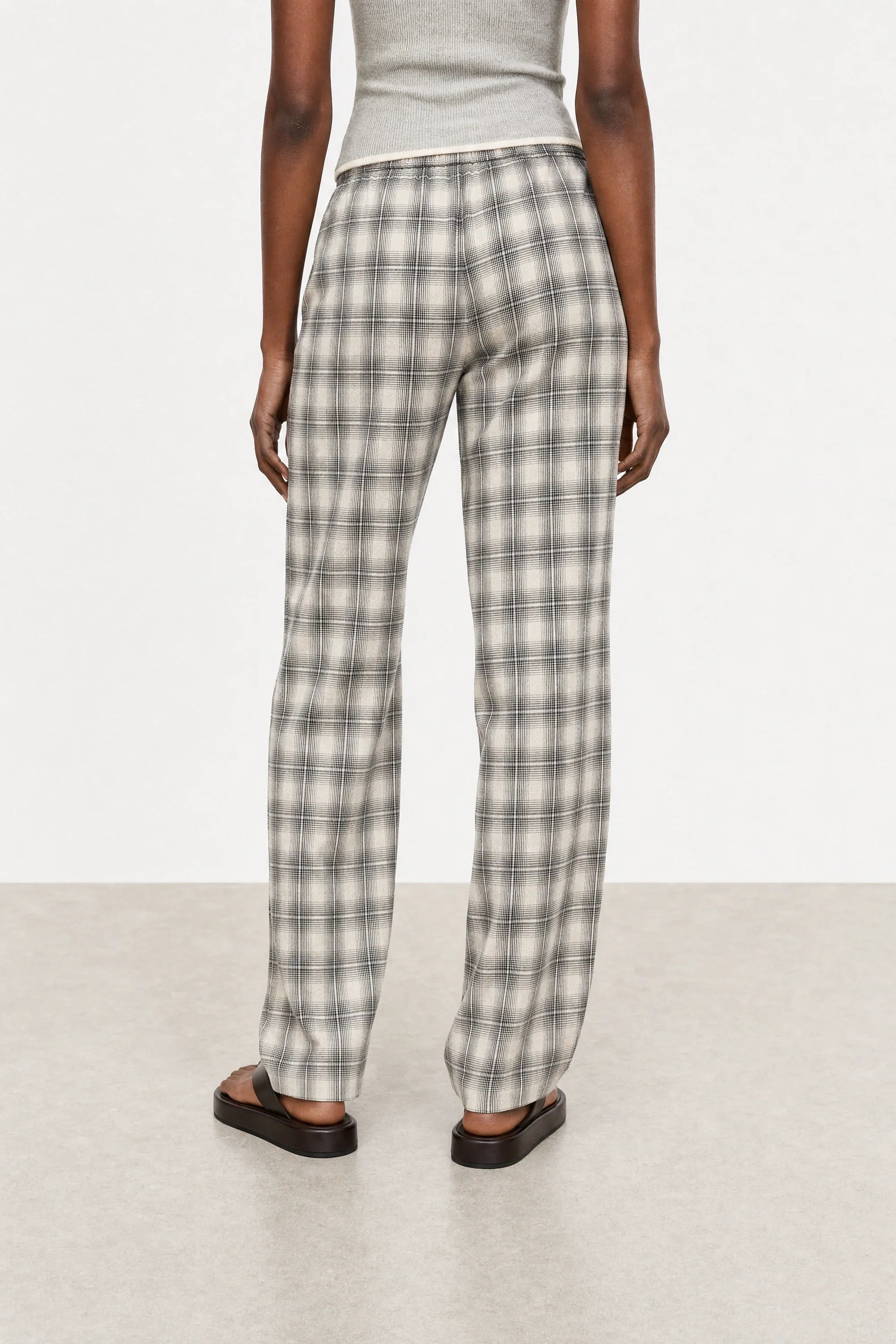 Ivory plaid tie waist trousers
