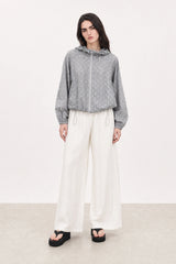 Light grey and white polka dot hooded windbreaker