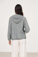 Light grey and white polka dot hooded windbreaker