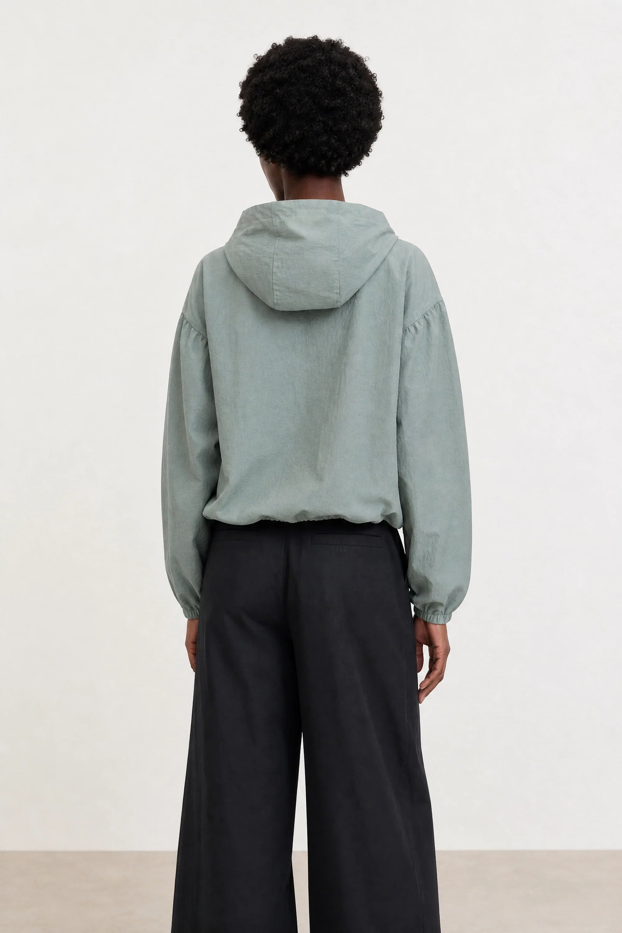 Light grey box textured hooded windbreaker