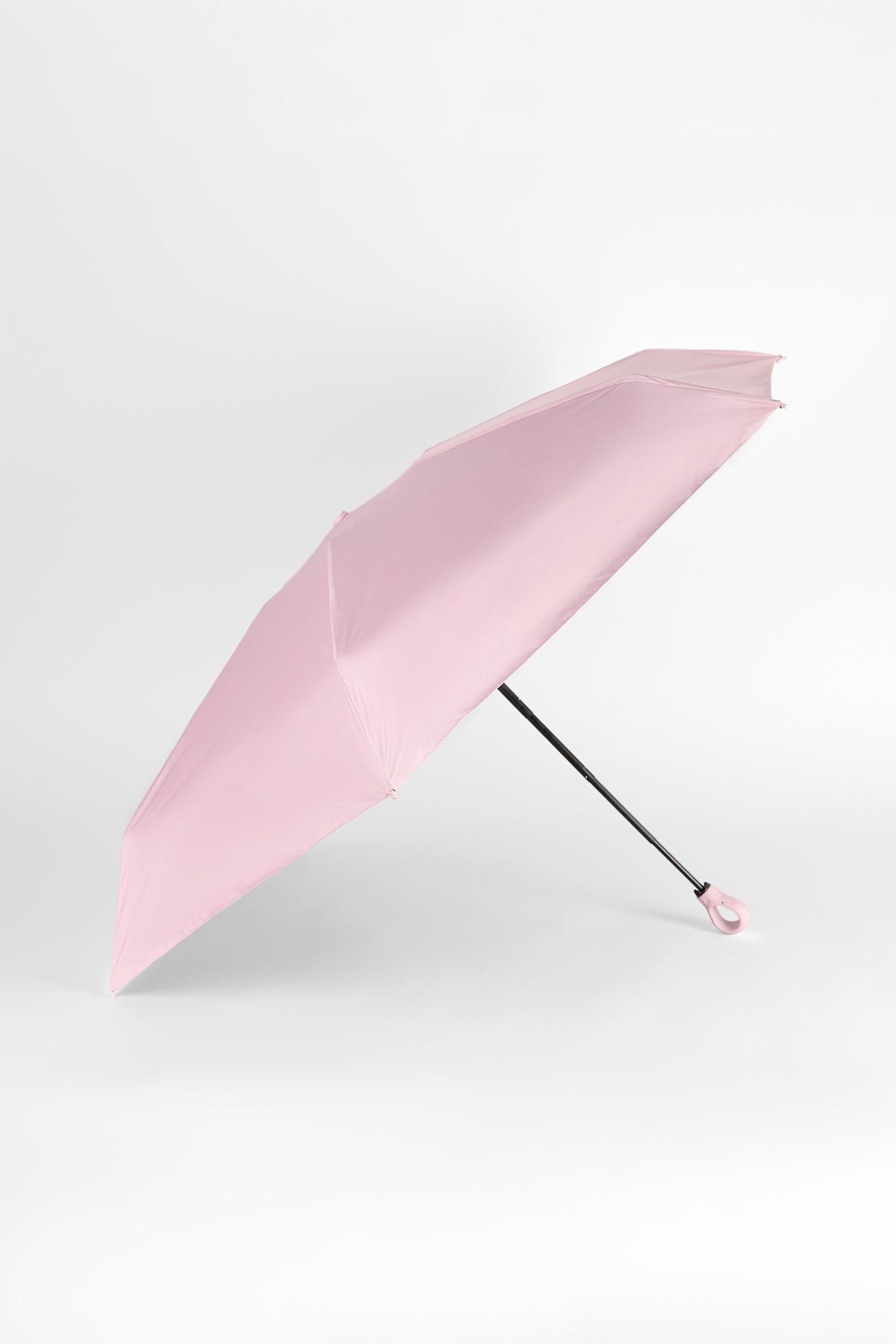 Light pink thick hooked handle umbrella