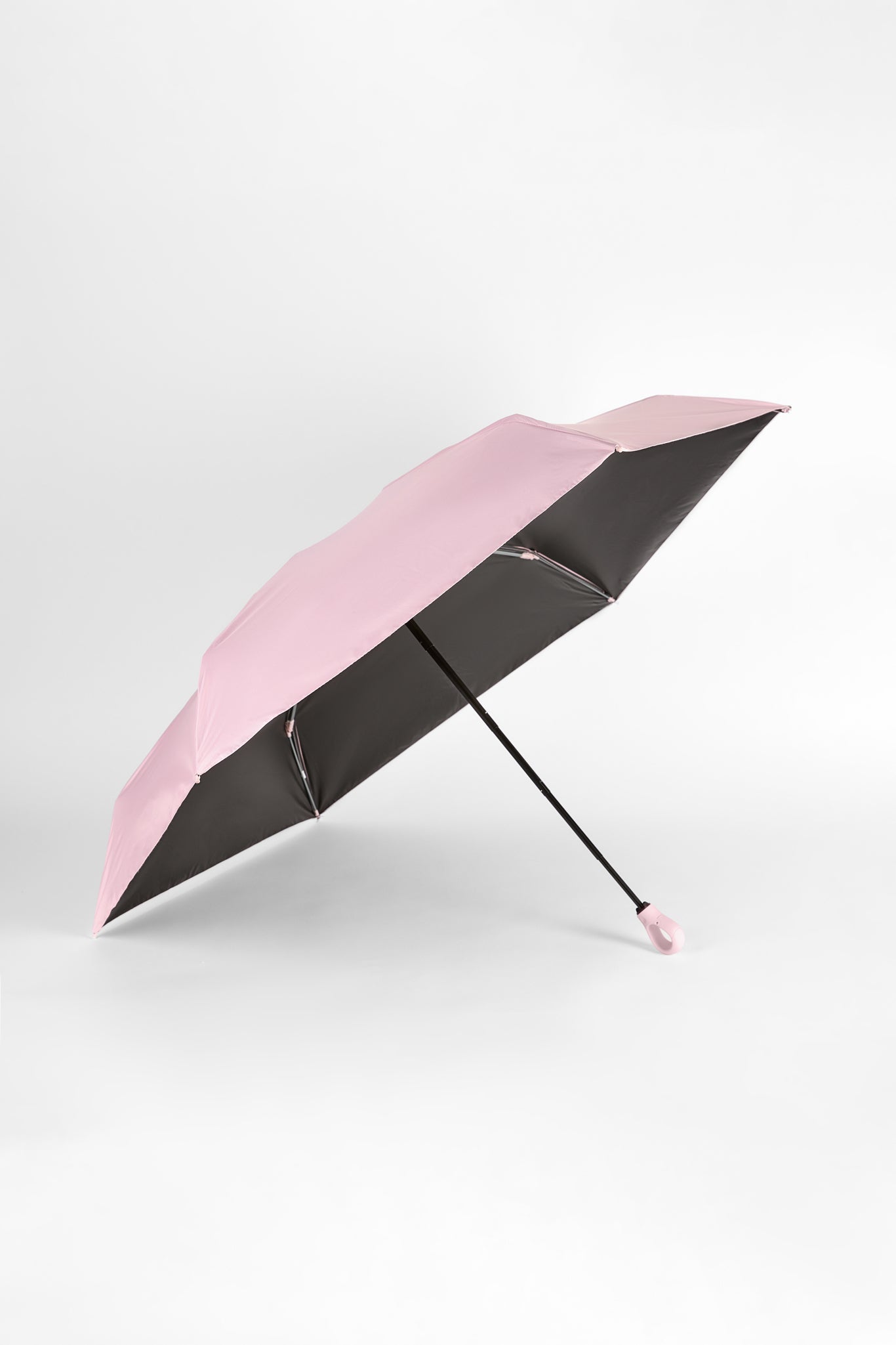 Light pink thick hooked handle umbrella