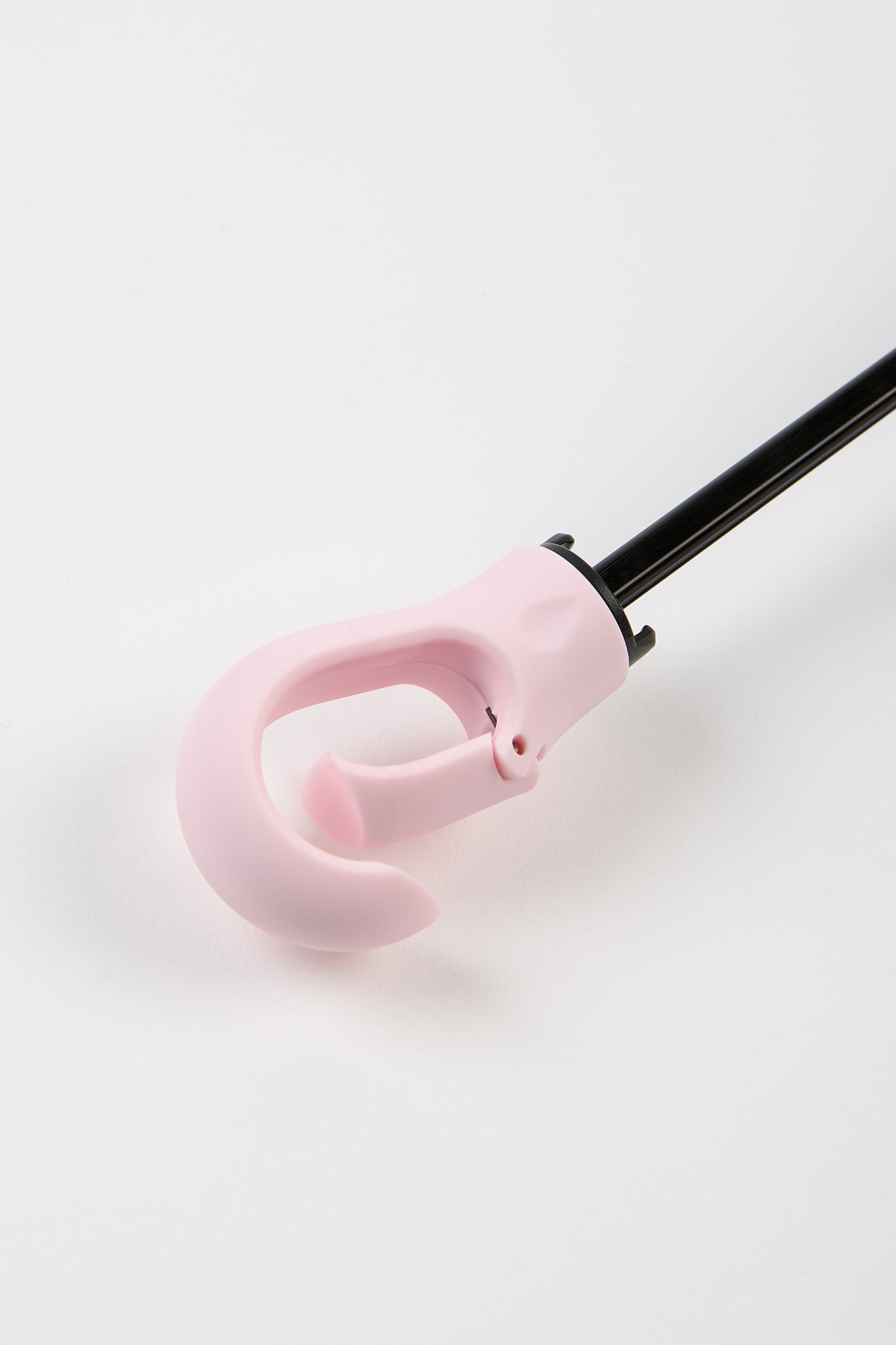 Light pink thick hooked handle umbrella