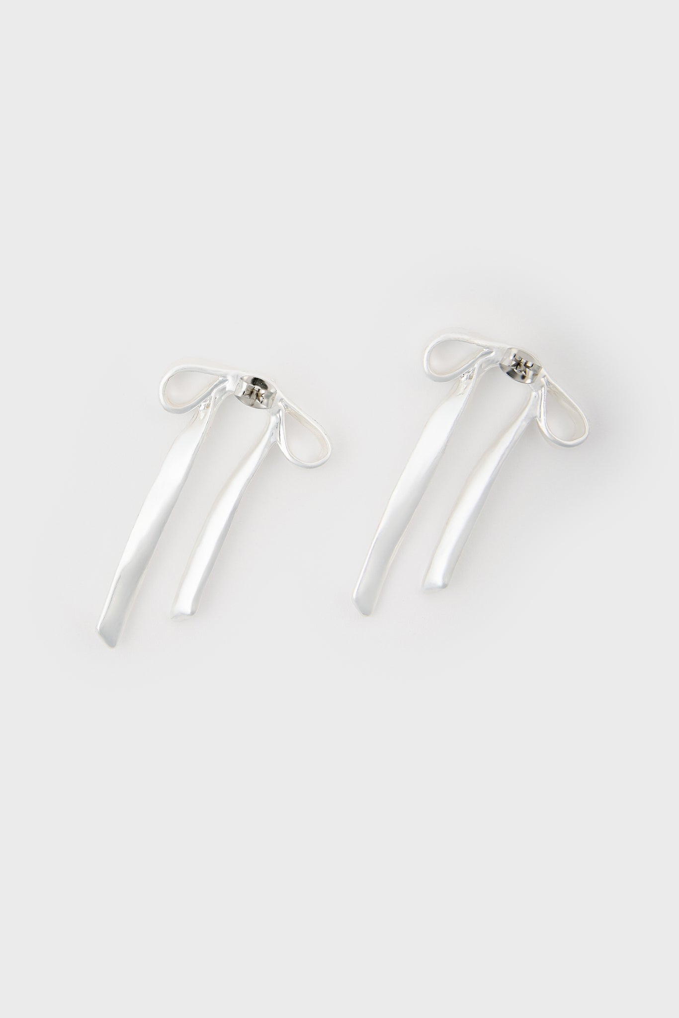 Matte silver ribbon drop earrings
