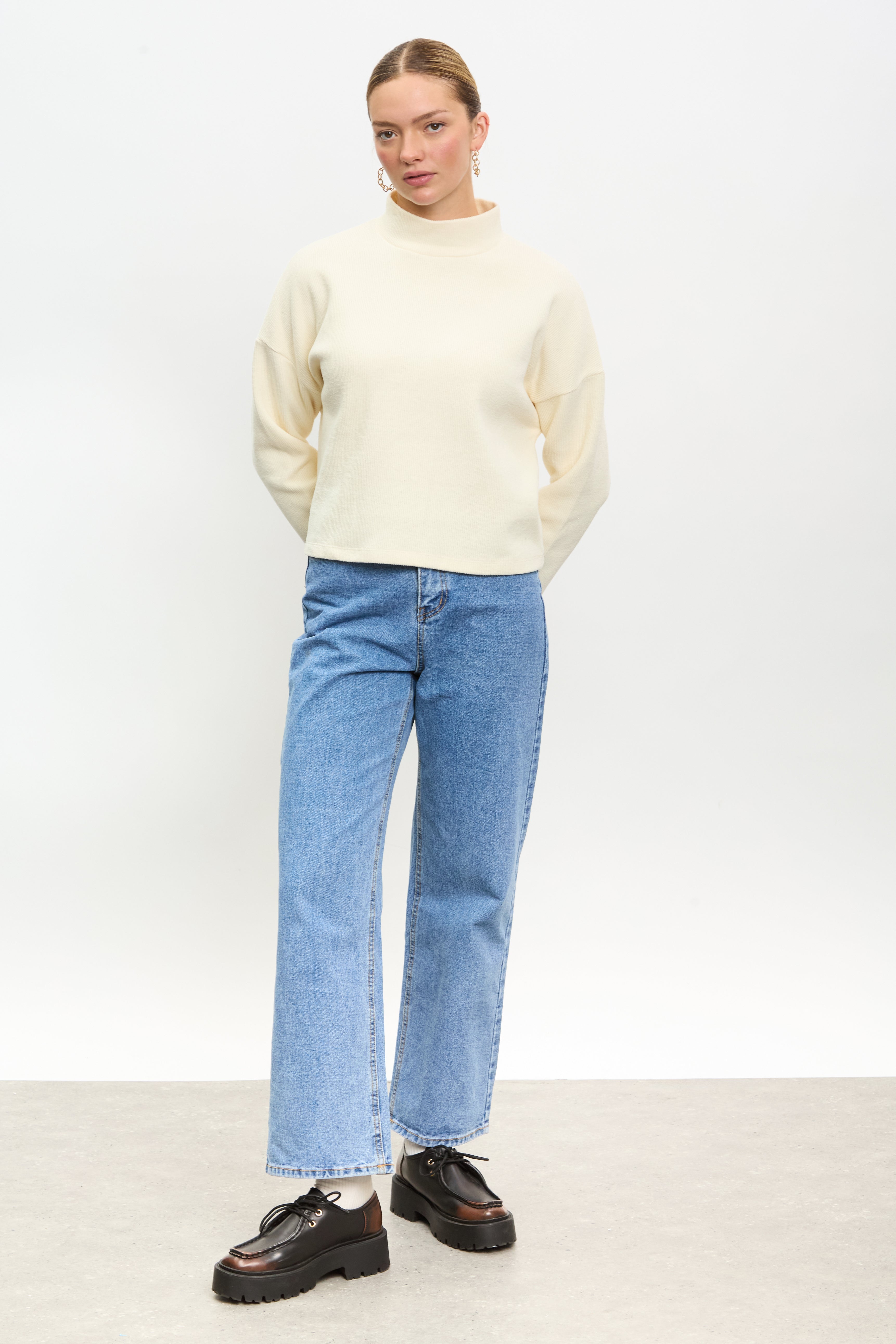 Ivory micro ribbed mock neck top