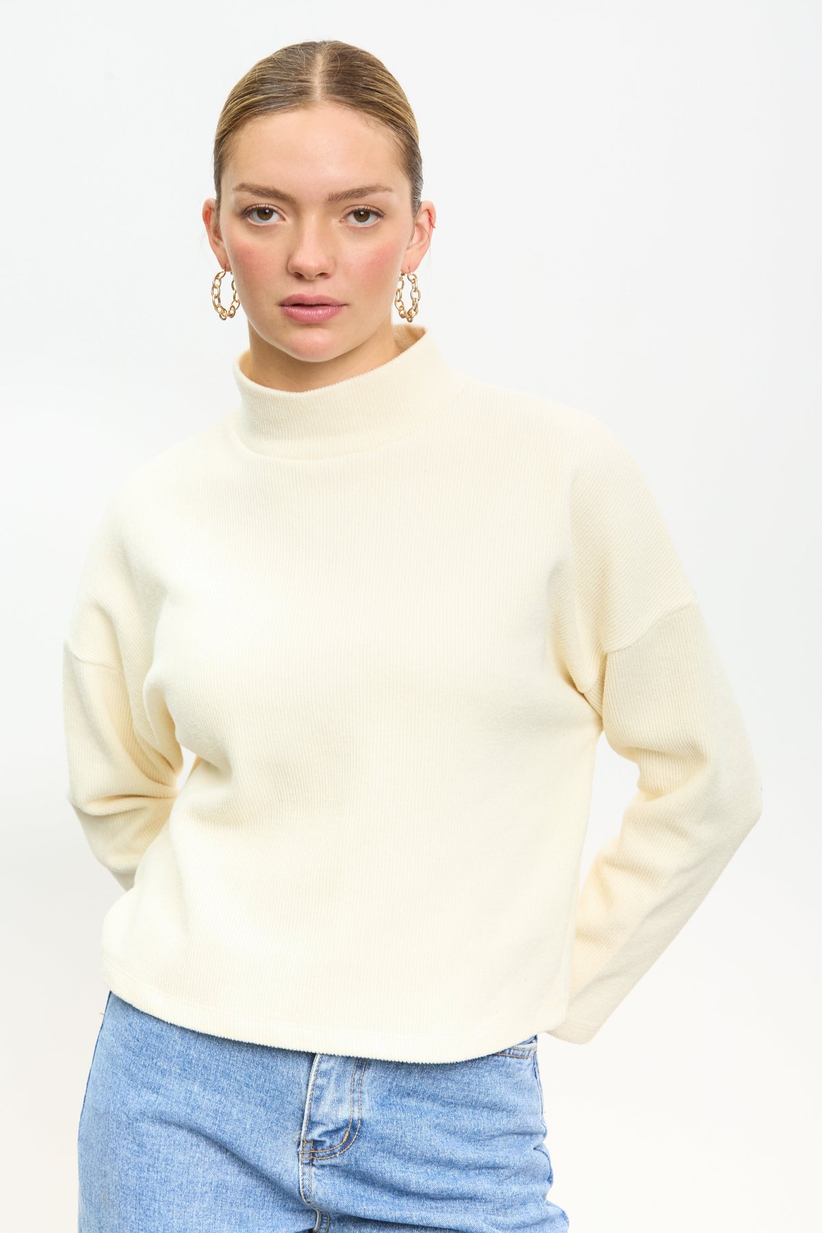 Ivory micro ribbed mock neck top
