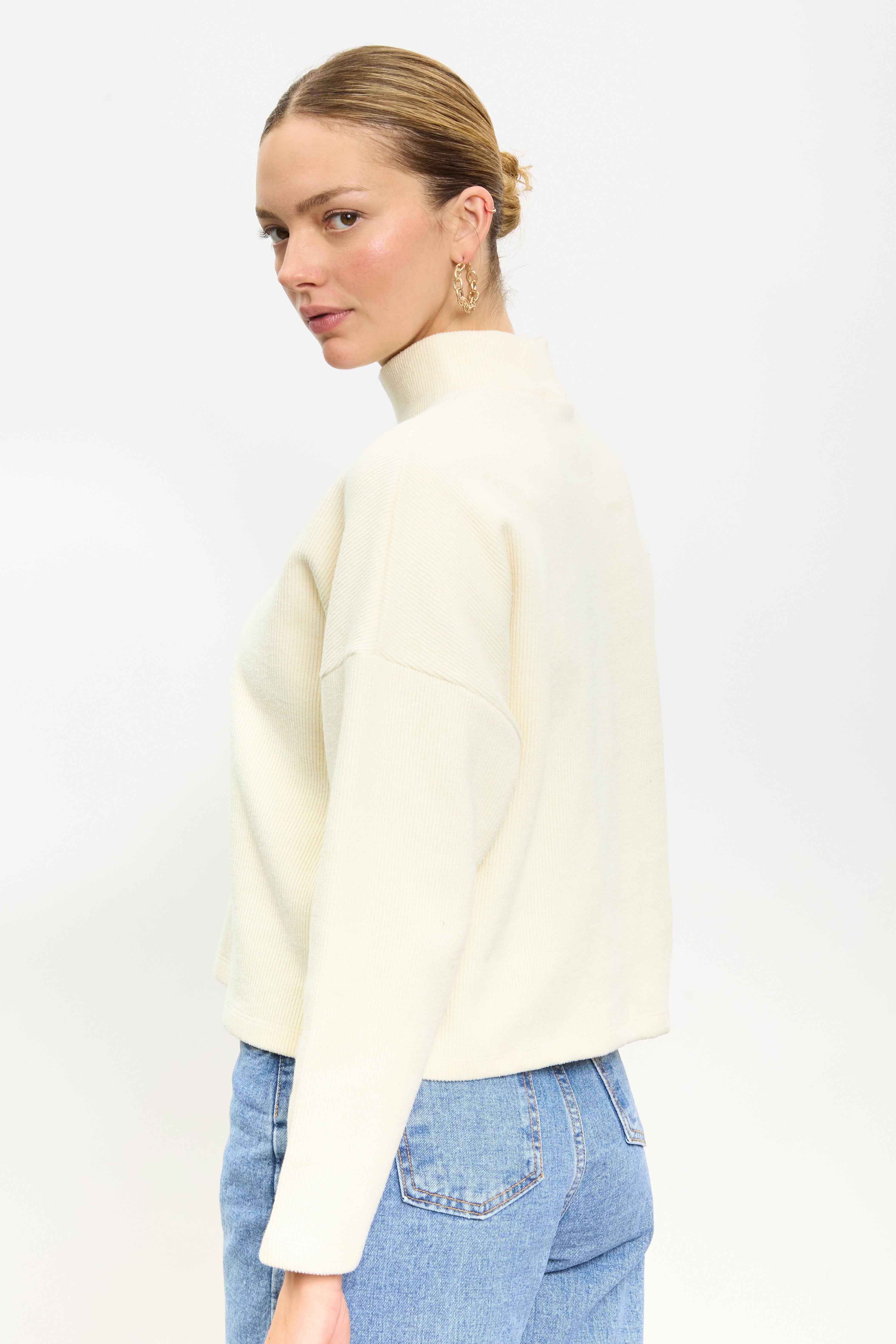 Ivory micro ribbed mock neck top