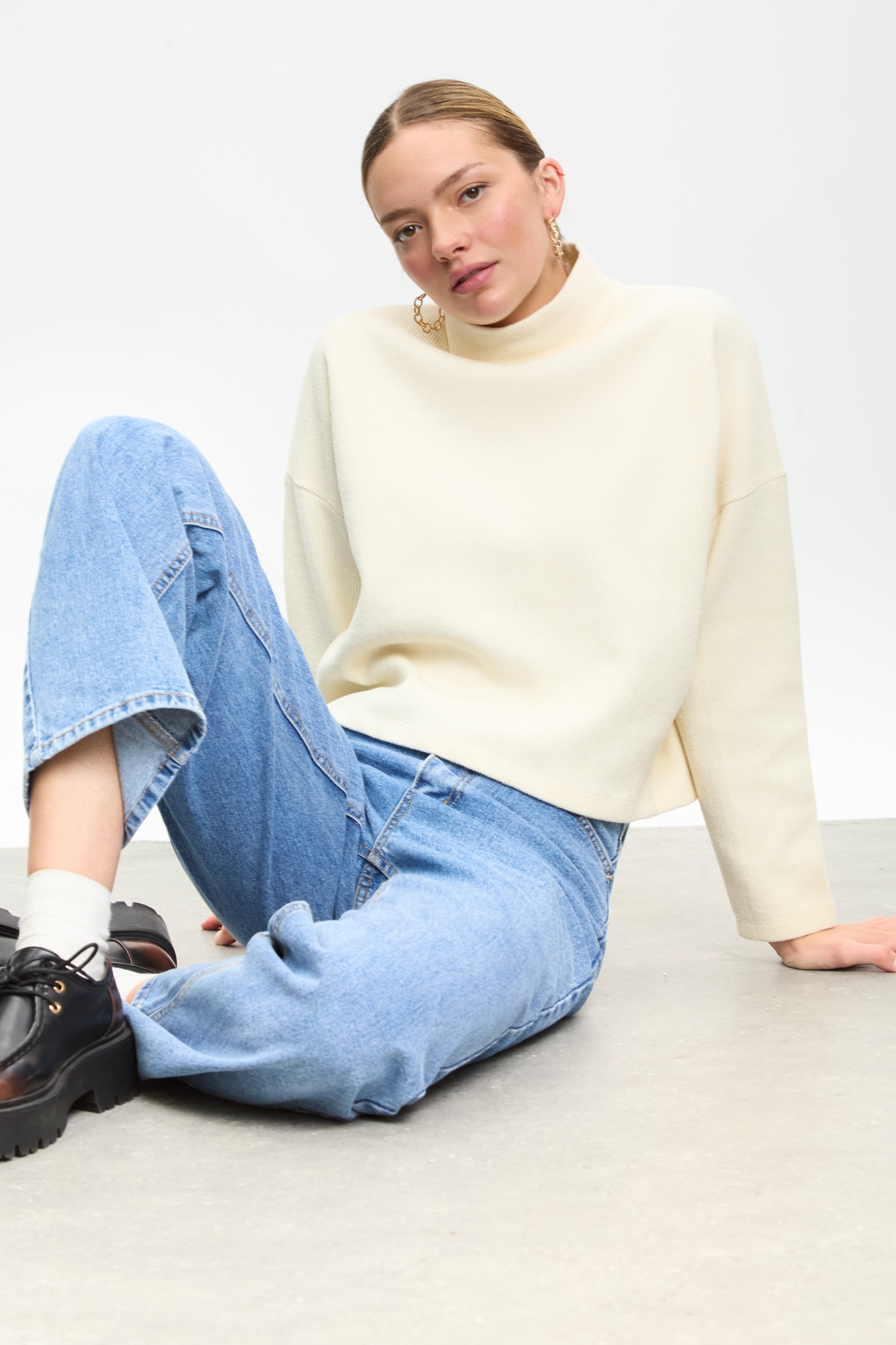 Ivory micro ribbed mock neck top