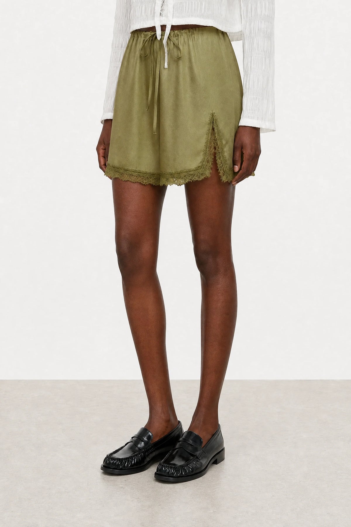 Olive green lace trim mini slip skirt
