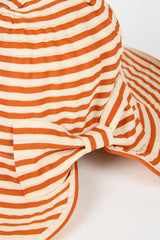 Orange and ivory striped wide brim sun hat
