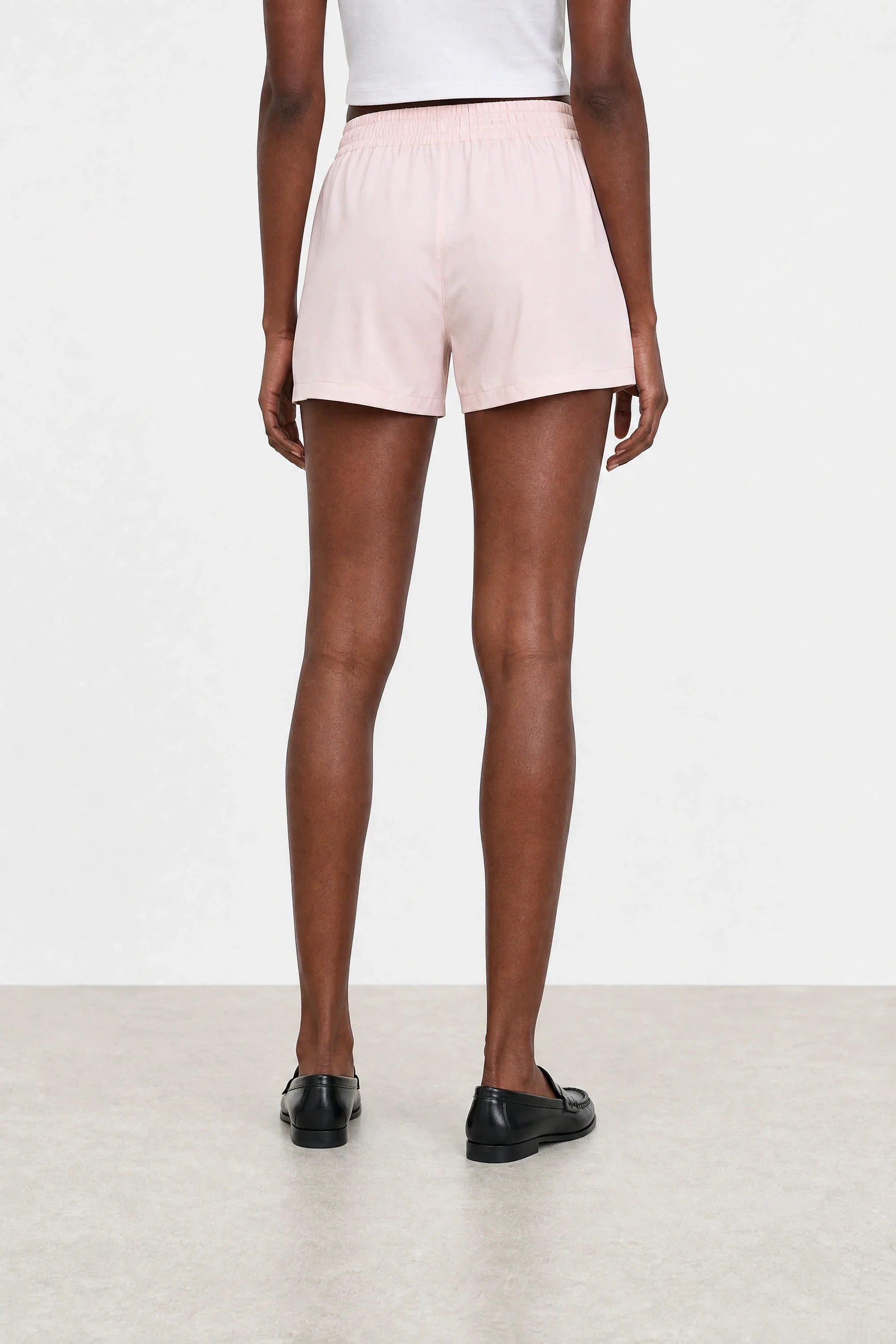 Pale pink vegan leather shorts