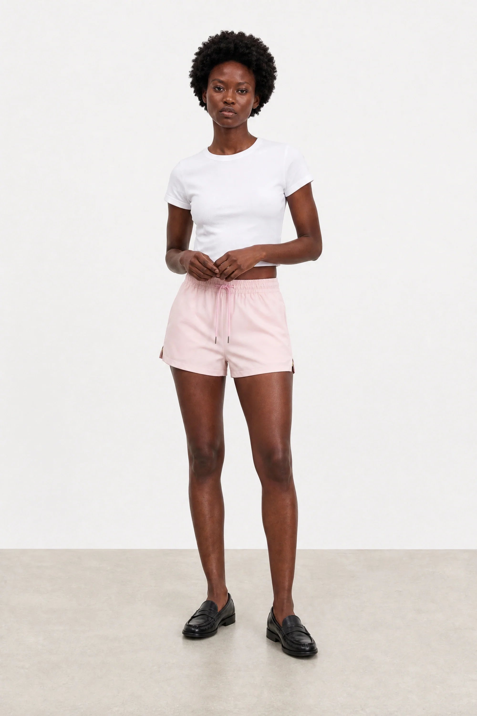 Pale pink vegan leather shorts