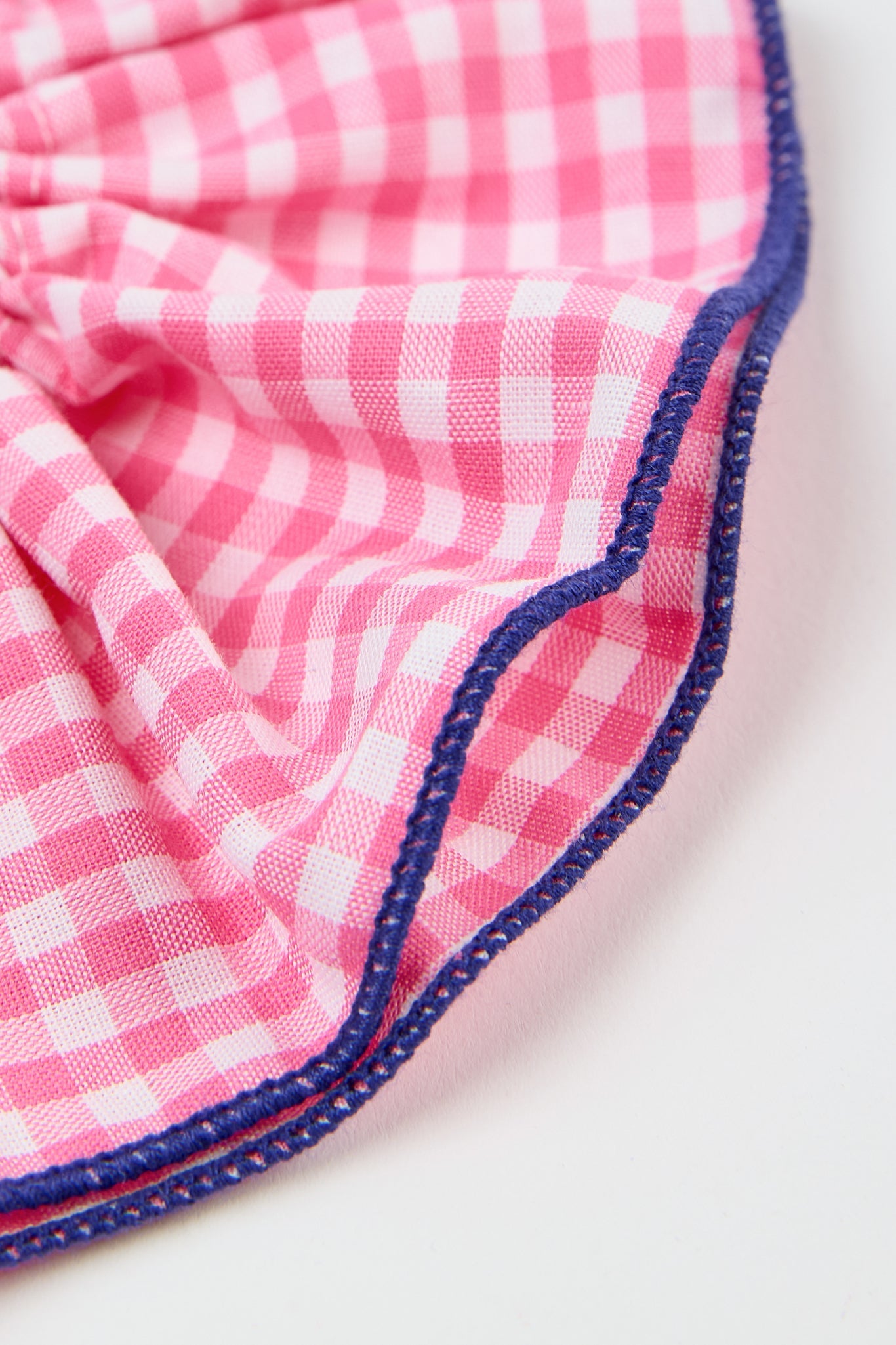 Pink gingham and navy trim scrunchie