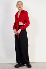 Red silky plunging tie front shirt