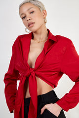 Red silky plunging tie front shirt