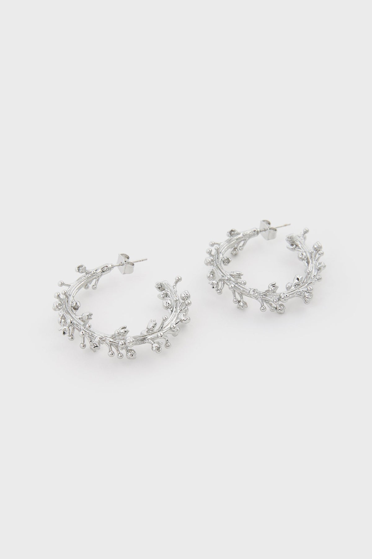 Silver branch hoop earrings