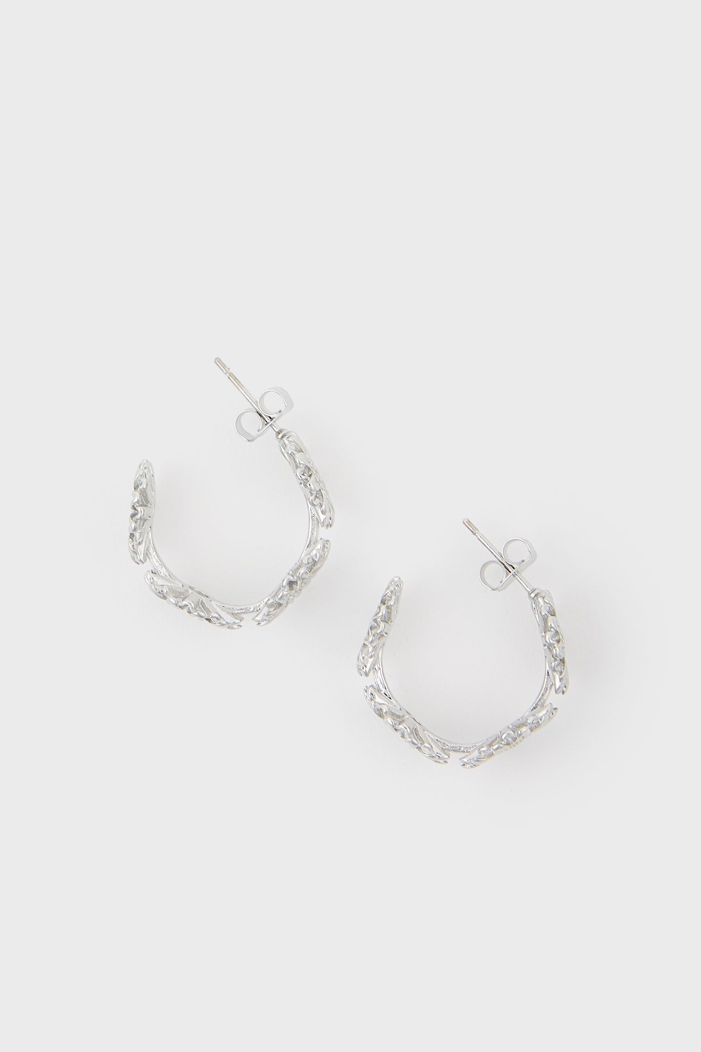 Silver daisy hoop earrings