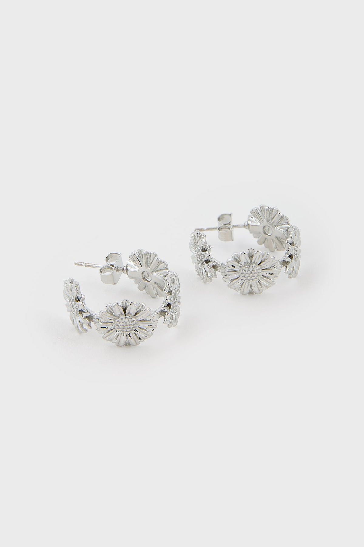 Silver daisy hoop earrings
