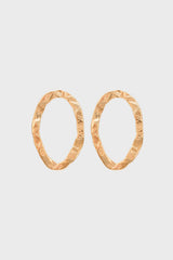 Gold flat hammered oval earrings