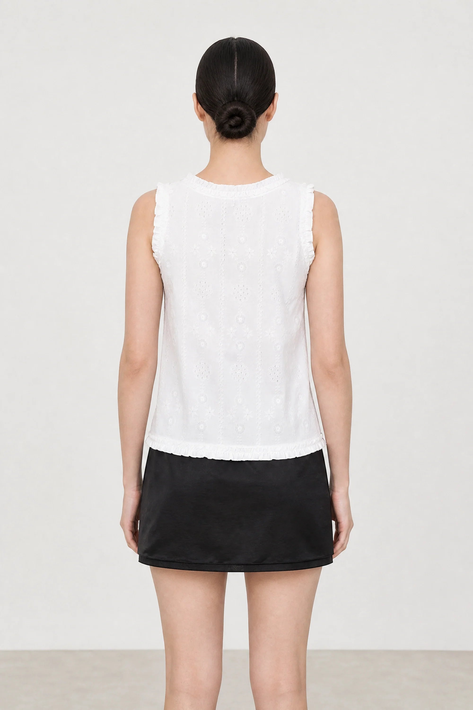 White embroidered tie front sleeveless top