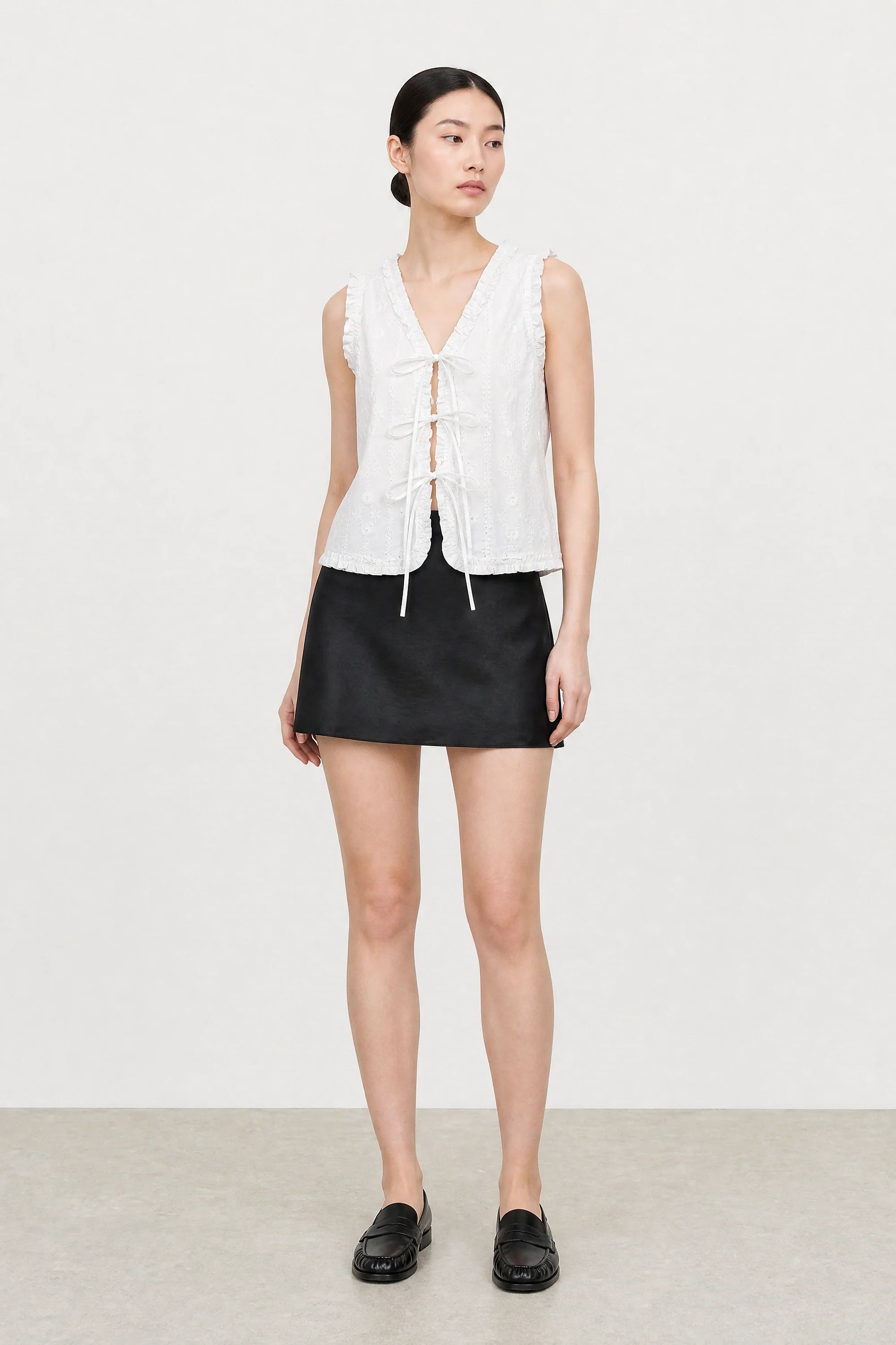 White embroidered tie front sleeveless top