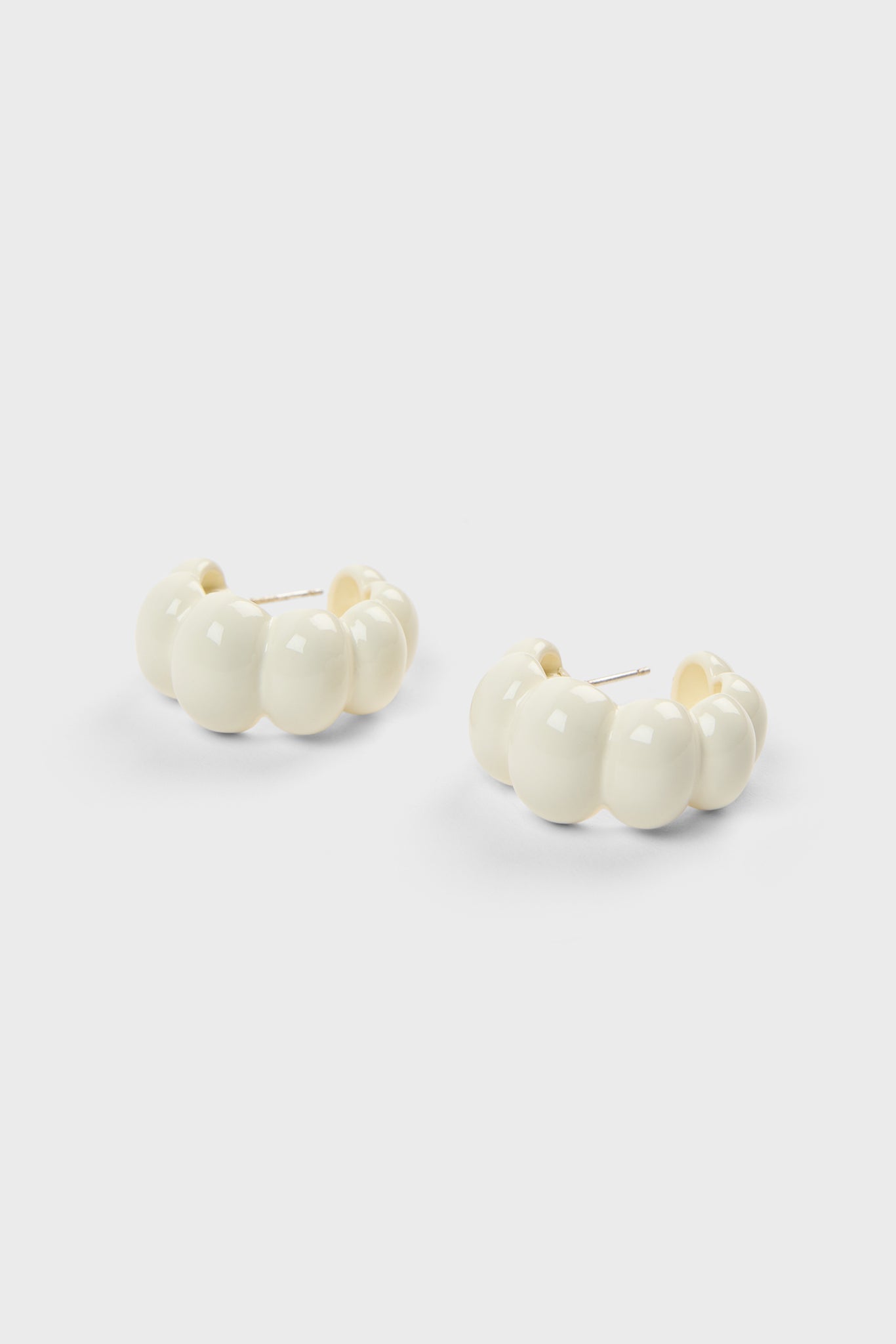 White enamel bubble hoop earrings
